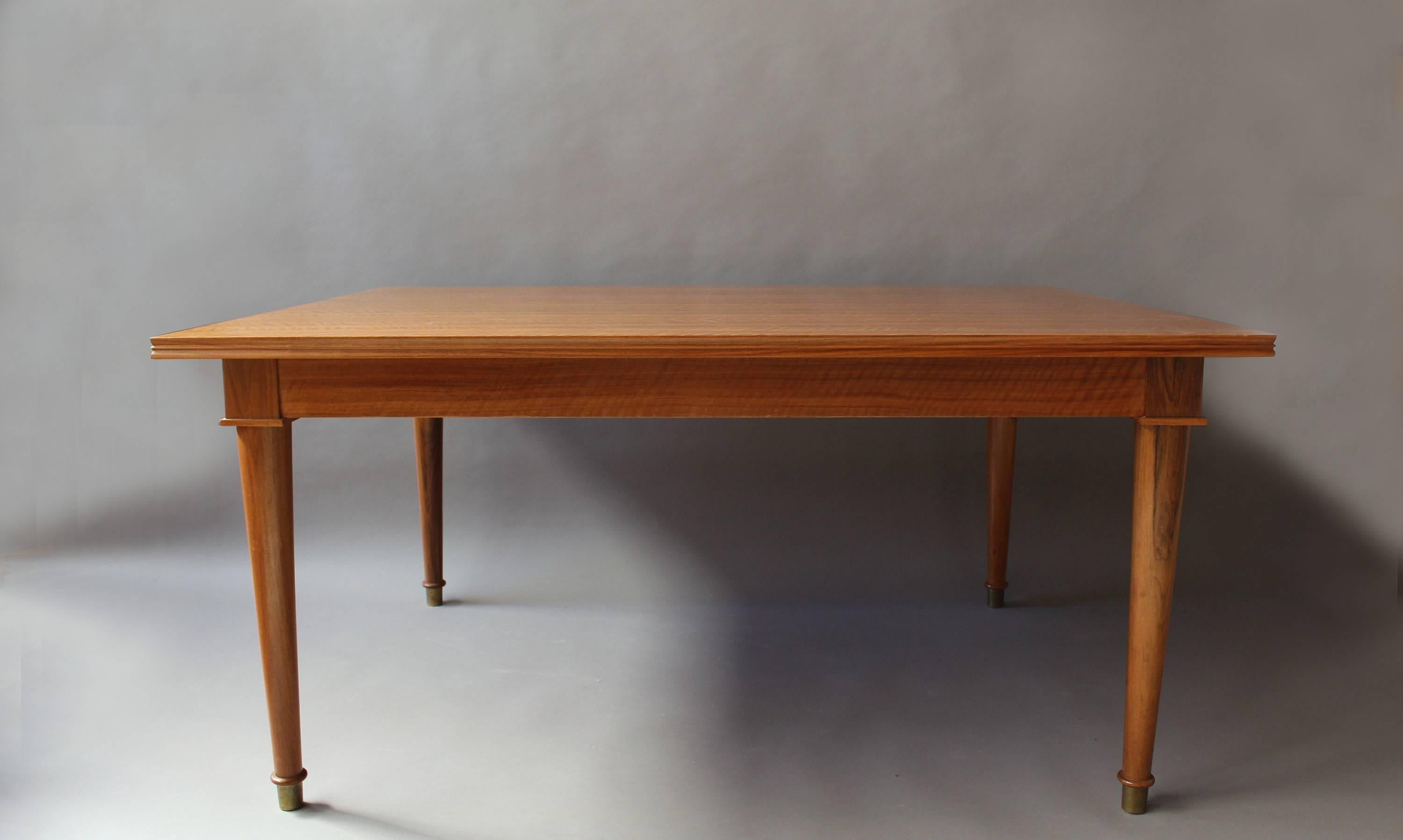 A Fine French Art Deco Extendable Walnut Dining Table by Jules Leleu 1