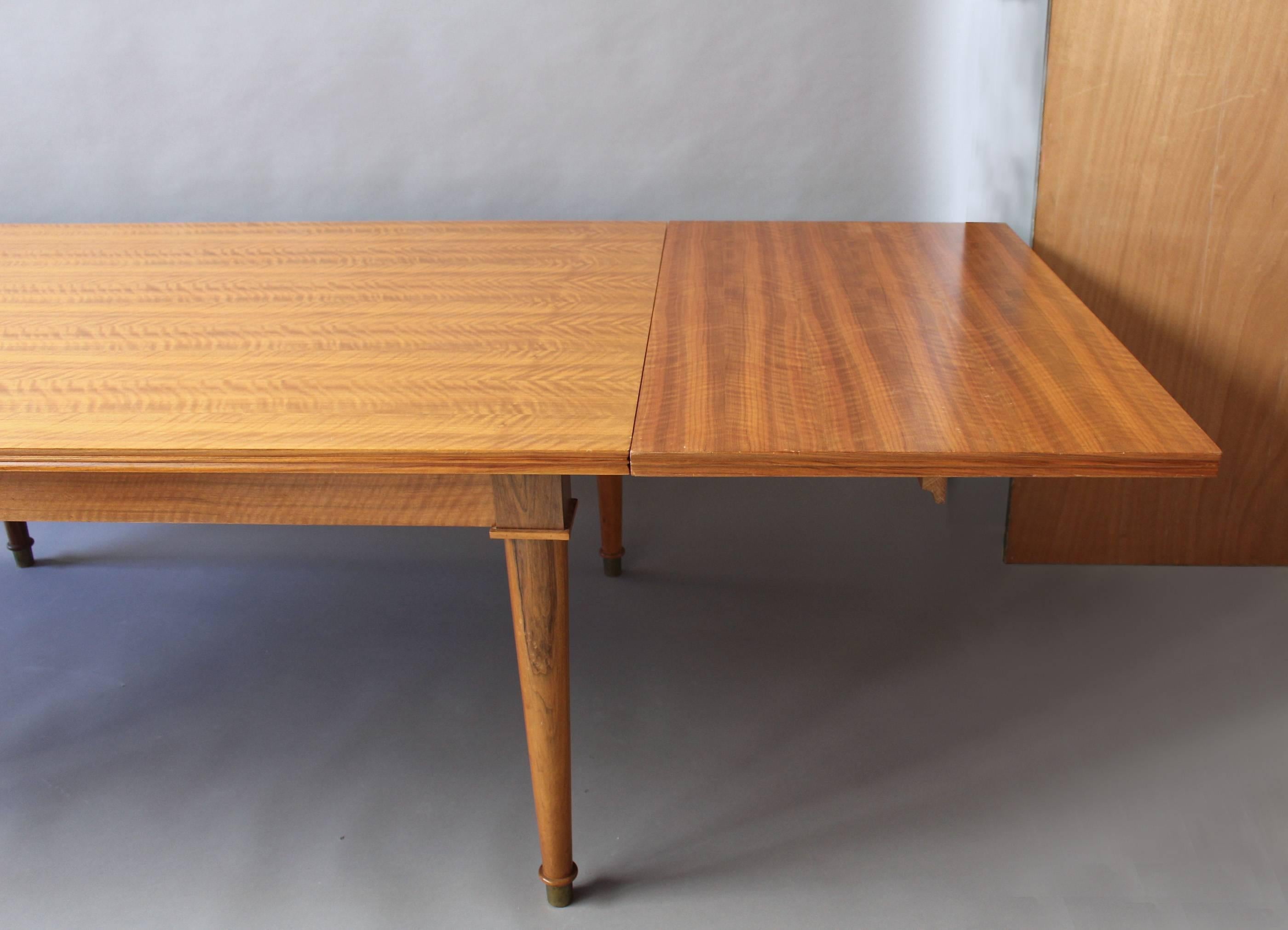 A Fine French Art Deco Extendable Walnut Dining Table by Jules Leleu 3