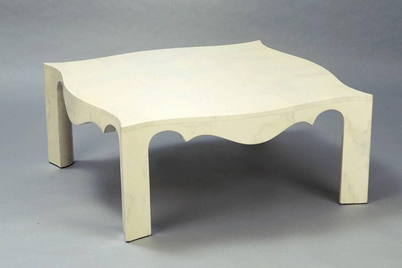 Serpentine-sided low table in lacquered wood. Custom-made by Quigley. Signed.