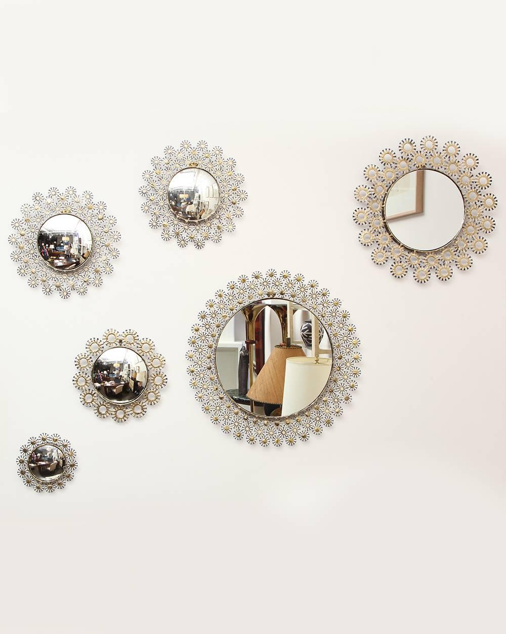 Liz O'Brien specially commissioned the artist Marie Suri to make a limited edition, small and especially giftable version of her Gigi mirrors for this holiday season! 
Available with either flat or convex mirrors, the frames are hand-forged and