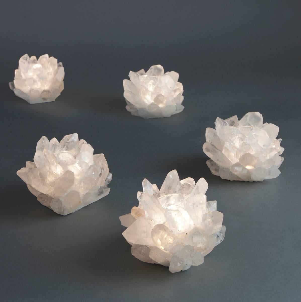 Crystal candleholders made expressly for Liz O'Brien.
Handcrafted with large pieces of natural rock crystal. Beautiful singly or as a group on dining tables or larger arrangements.
Gift wrapped in Liz O'Brien boxes.