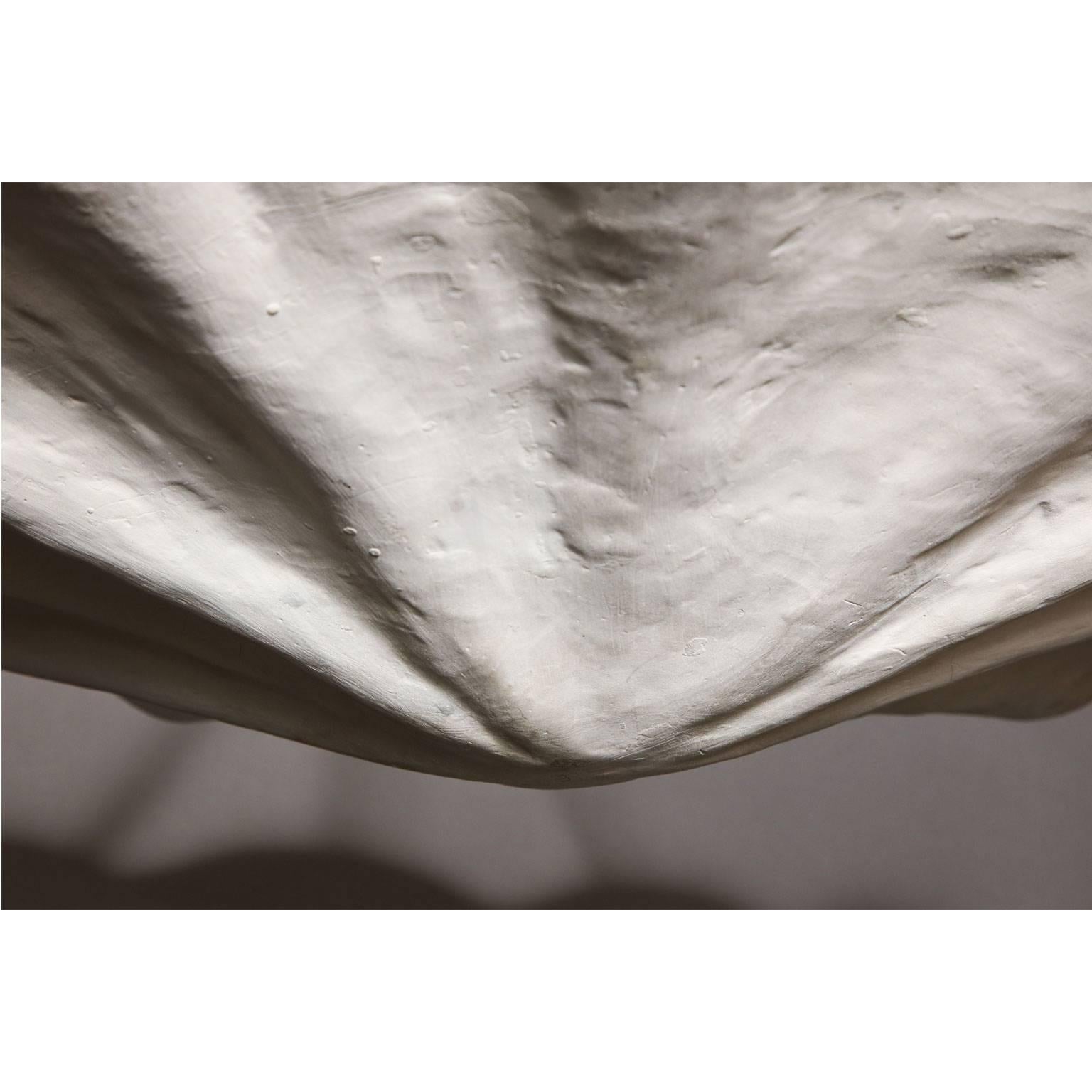 Frances Elkins (1888-1953)
Scalloped plaster plafonnier suspended from three chains.
American, circa 1940.

Provenance:
Estate of Frances Elkins’ daughter Katherine Elkins Boyd, Hillsborough, CA.


Measurements:
12” H x 24” D.
  