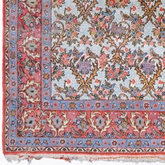 Tapis ancien à motifs floraux de la fin du 19e siècle