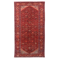 Tapis ancien aux motifs floraux, géométriques et tribaux - Fin du XIXe siècle