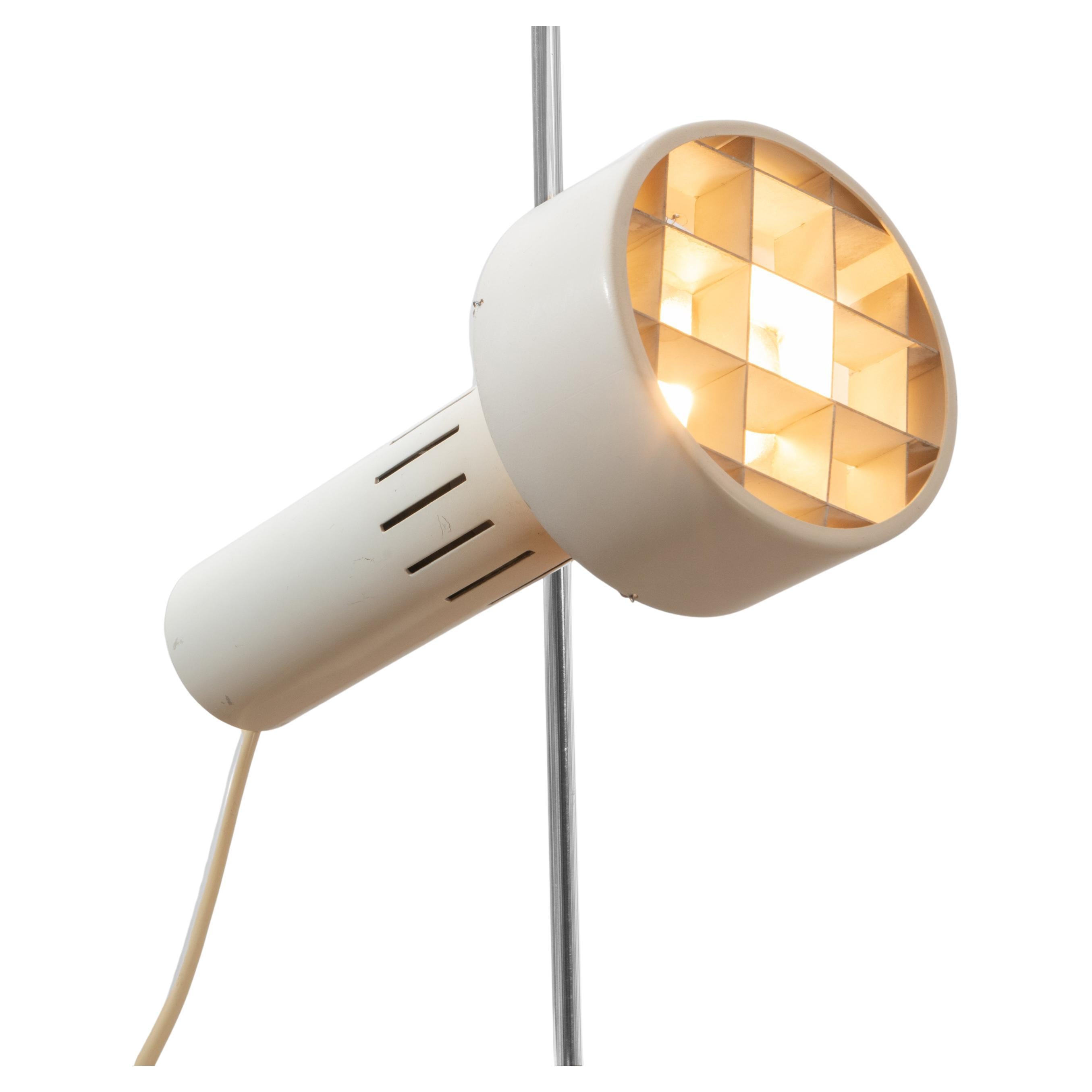 A set of 4 floor lamps model A15 designed by Alain Richard and produced by Disderot between 1958 and 1969. These lamps with a very pure and elegant design were only produced from 1958 to 1969, so they are not edited anymore. They have a marble base