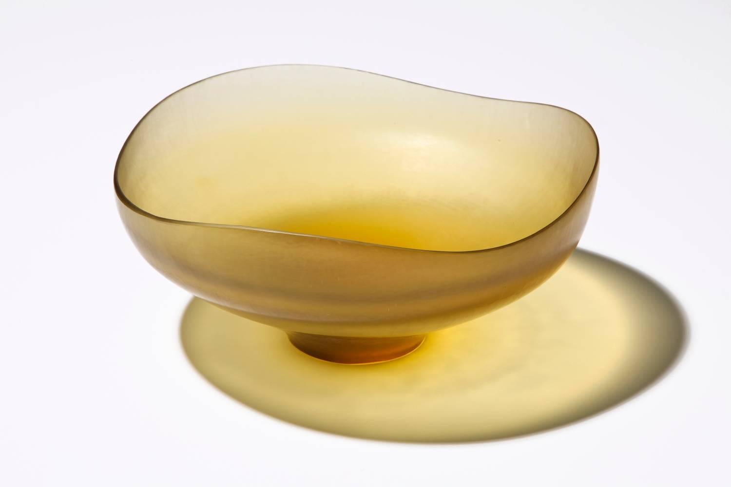  Battuto Bowl by Tobia Scarpa for Venini. Model #8505 footed bowl of wheel-carved amber colored glass. A great example of hand worked Murano glass. This piece was purchased directly from Venini, Murano, circa 1978.
Etched signature on underside.