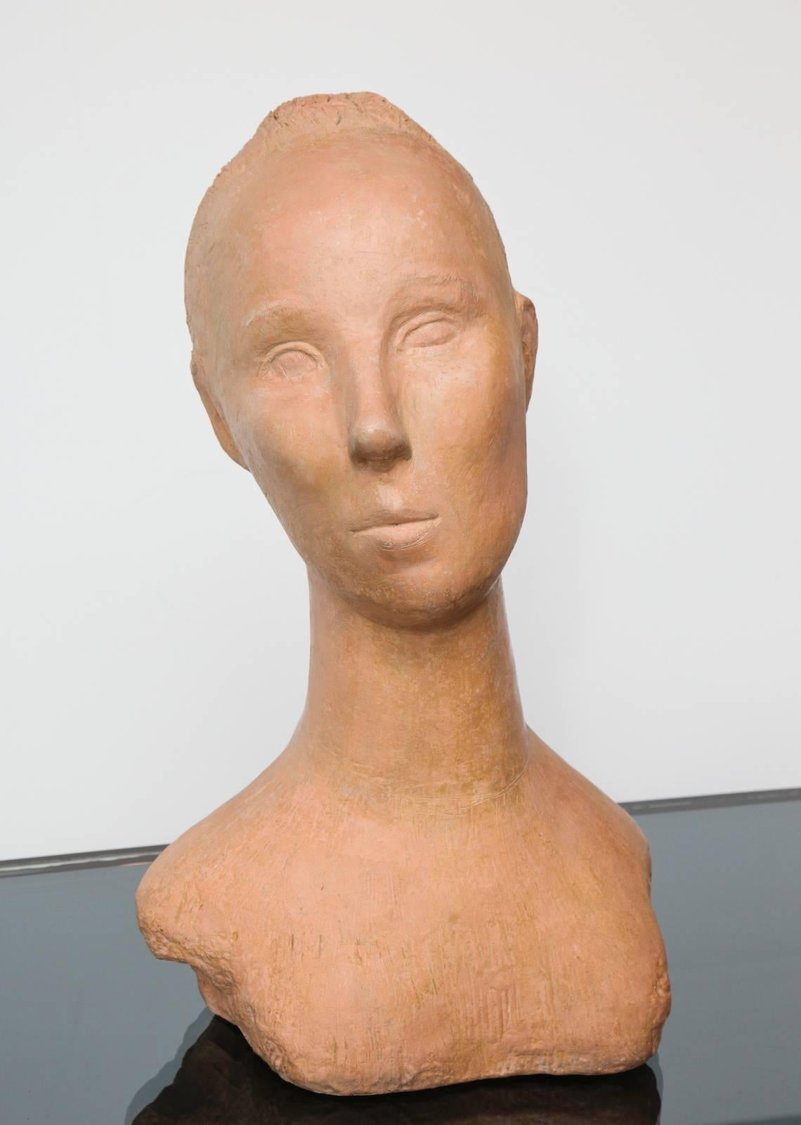 Hand-built terra cotta bust. Signed on lower rear. 
Published: “American Art Today, Gallery of American Art Today, New York World’s Fair.” Whalen & Goodyear, pg 201.
*This sculpture was exhibited in the New York, 1939 World’s Fair.