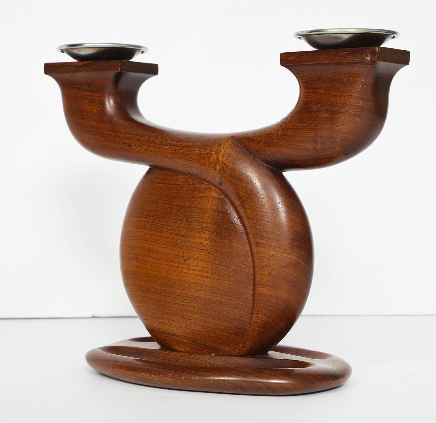 Solid ebony candlesticks. Hand-sculpted with metal bobeche inserts. Each piece is signed on underside.