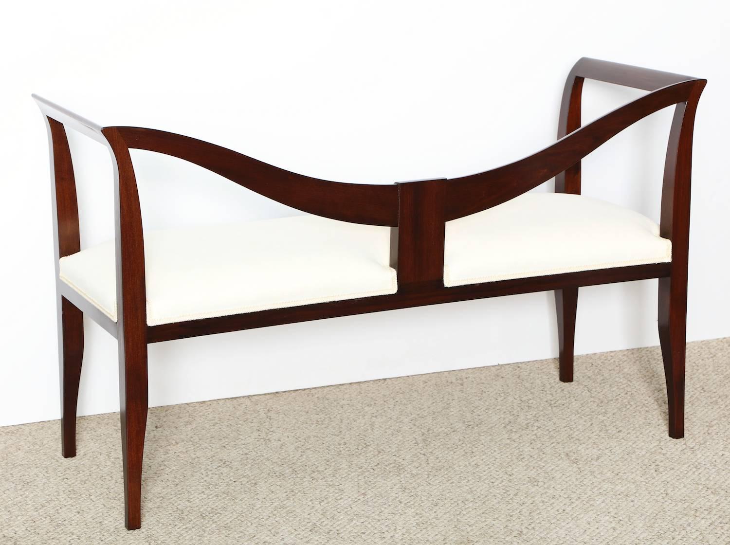Elegant bench with curving, dark-wood frame and upholstered seat. Recently refinished and re-upholstered. Published in L'Arredamento Moderno, 2nd series, 1939. Fig. 512.