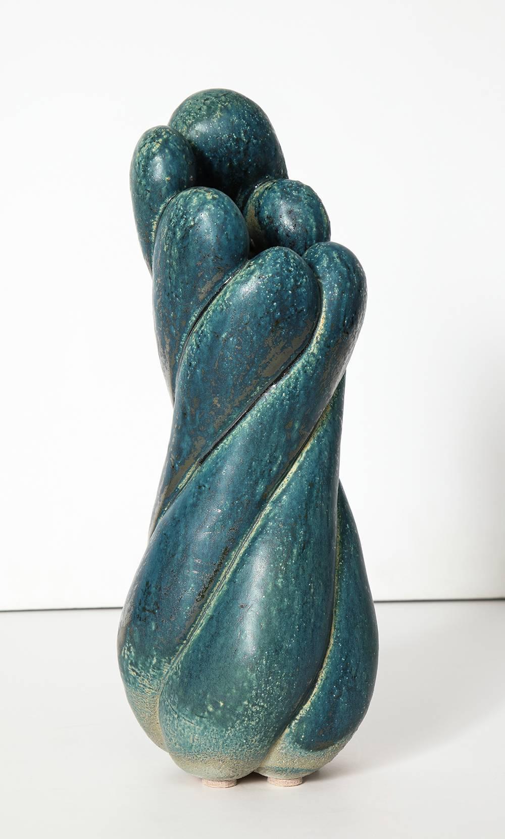 Handmade stoneware vase form, with teal blue glaze. Artist-signed and dated on underside.
  