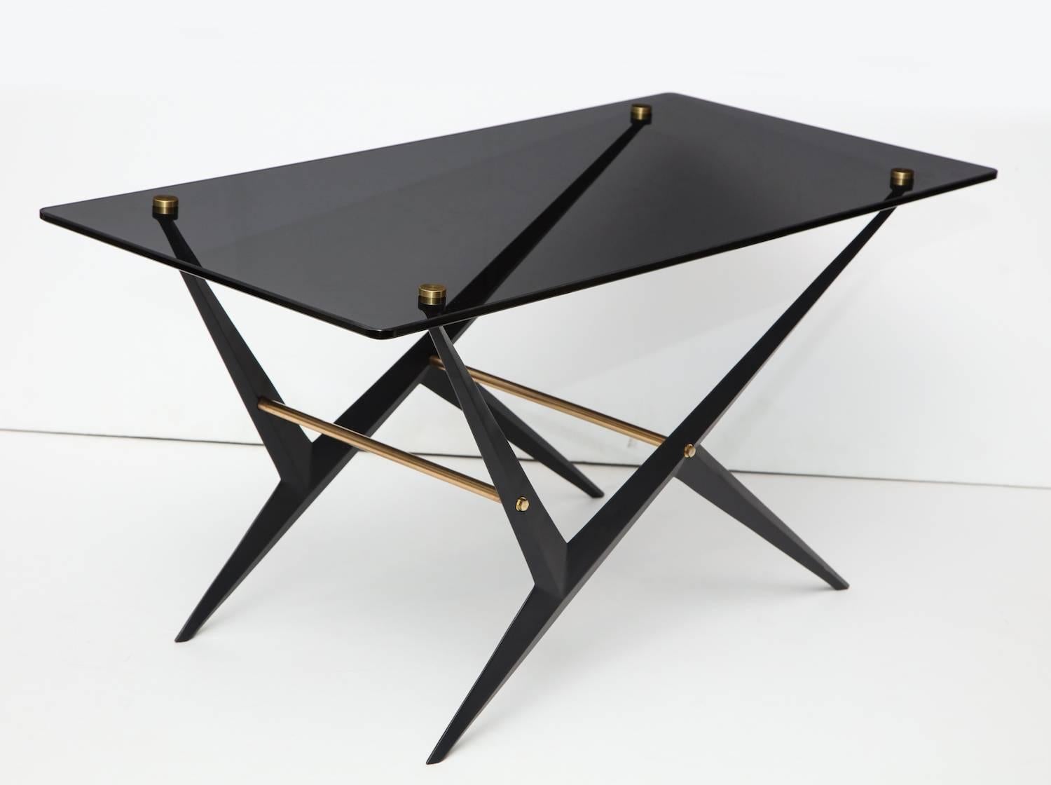 Angelo Ostuni low table. Black-painted metal with polished brass mounts and smoked glass top. A great architectural design.