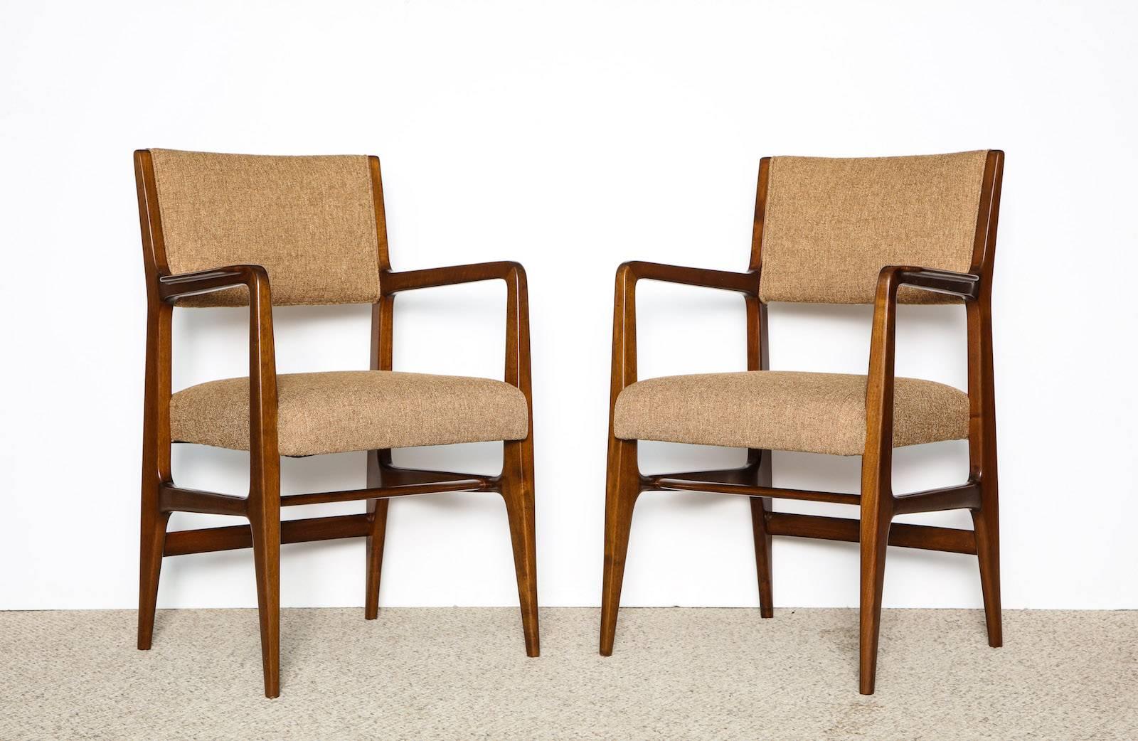 Rare pair of armchairs by Gio Ponti for M. Singer & Sons.
Mahogany frames with recently upholstered seat and back. Iconic Ponti forms in excellent condition. 
 