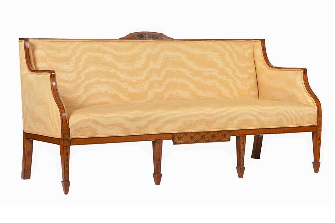 19th century satinwood box sofa. On six tapering legs.