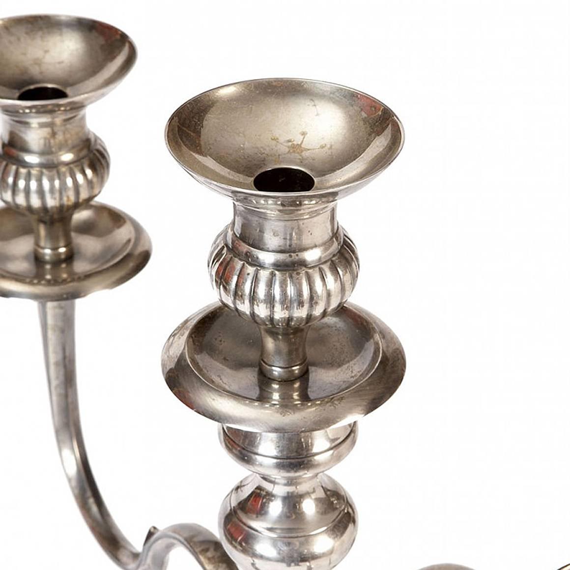 Large George III silver plate candelabrum. With an ovoid fluted body on a platform base.
