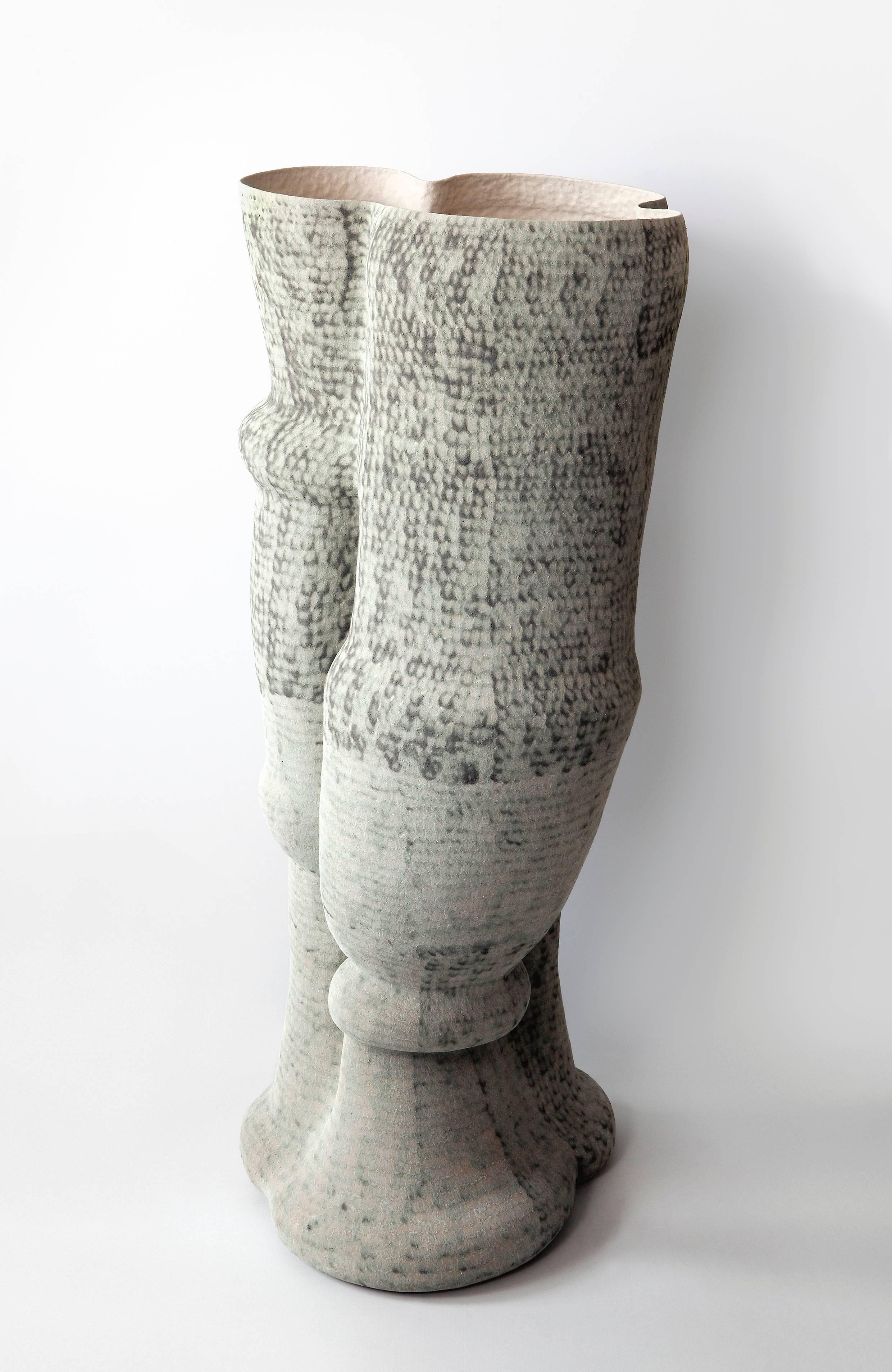 Ceramic sculpture by Kristina Riska, 2015,
Arabia Studio, Helsinki, Finland.
Measures: 52" H x 18" W.

Kristina Riska is a ceramic artist recognized for her unorthodox large scale pottery and artworks inspired by nature and the