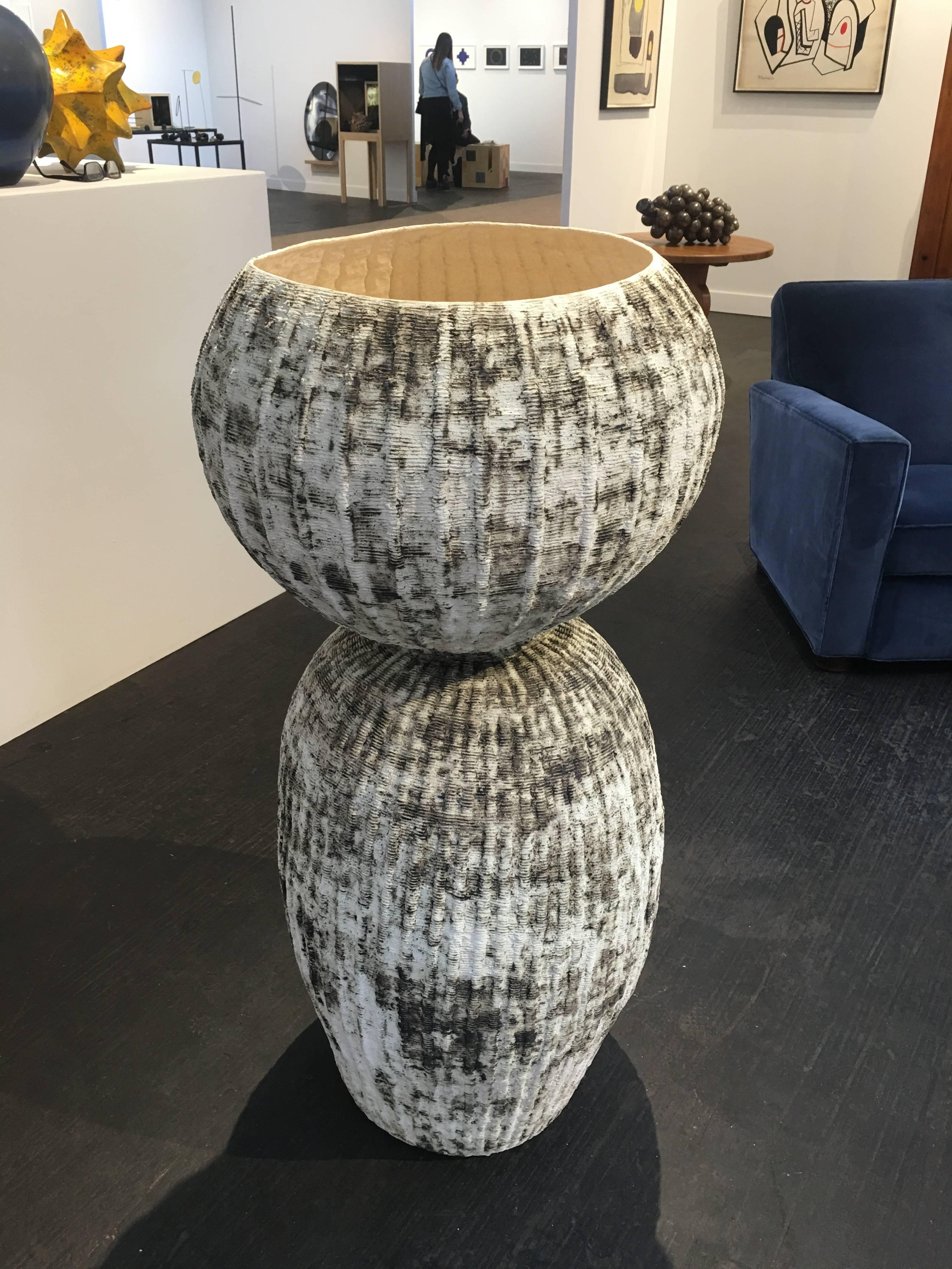 Bubble Urn lII B by Kristina Riska is a handbuilt ceramic urn created in the coil method. This modern sculptural form was created in 2015 for a special exhibit at the Finnish consulate in Washington, DC in September of 2015.

Kristina Riska is a