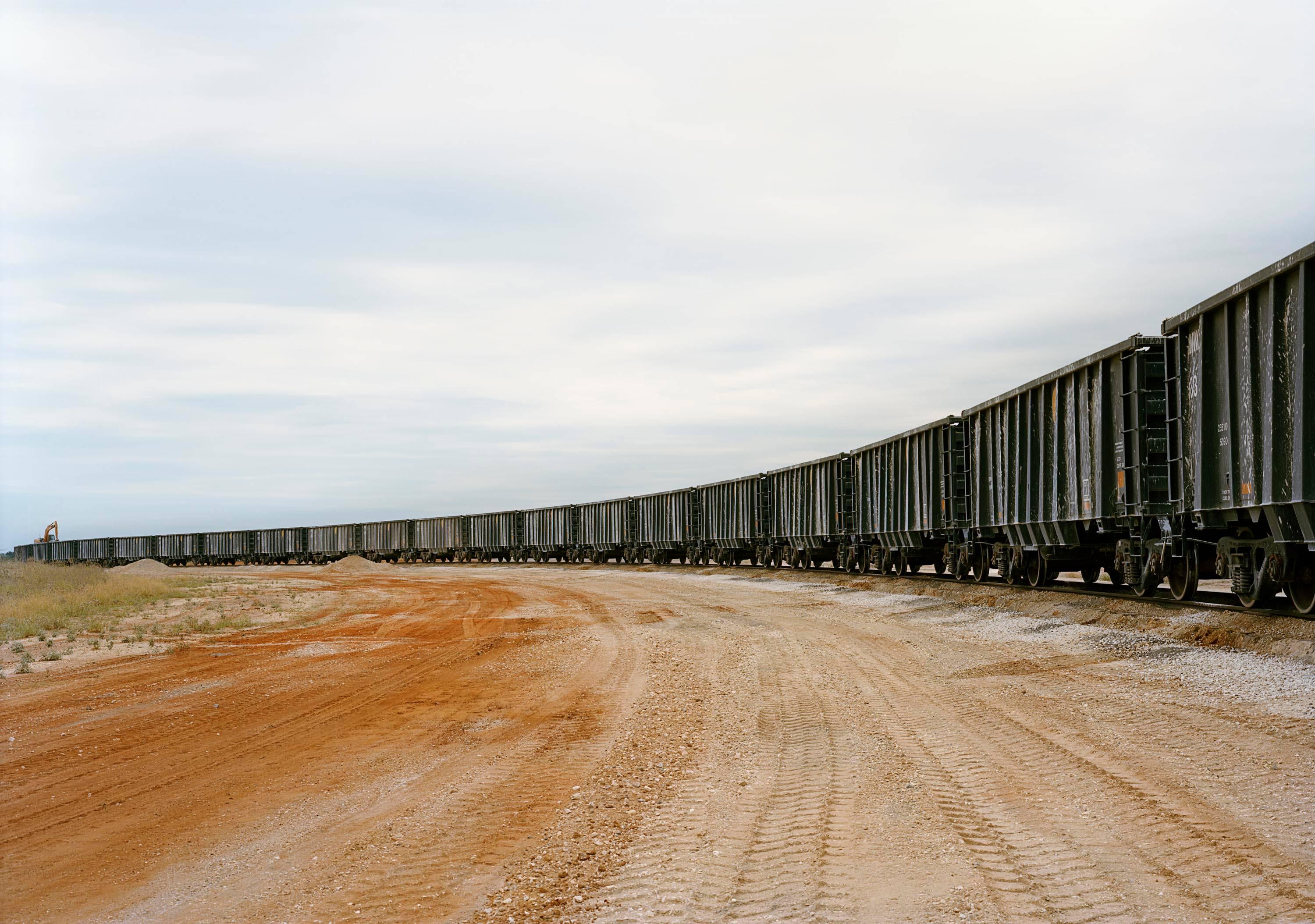 Victoria Sambunaris
Untitled (rail yard) and untitled (rail car unloading), Near Cotulla, TX, 2012 (diptych)
two chromogenic prints
Dimensions: 39 x 55 inches each
Edition of five.