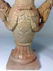 Commanding Pair of Lidded Ram's Urns