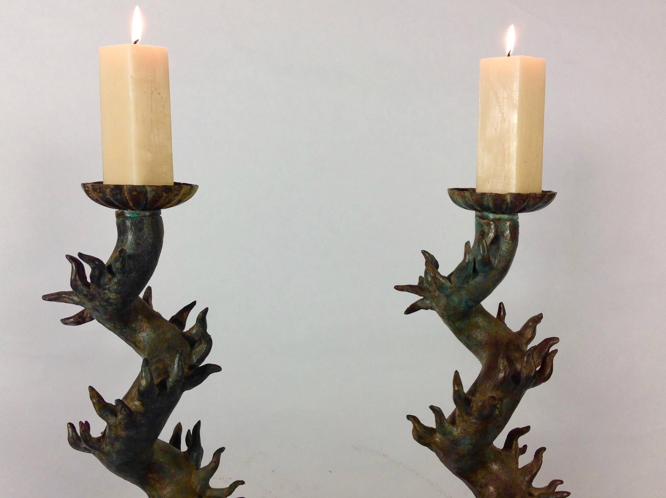 Riveting pair of bronze candlesticks by California design legend, Luciano Tempo.