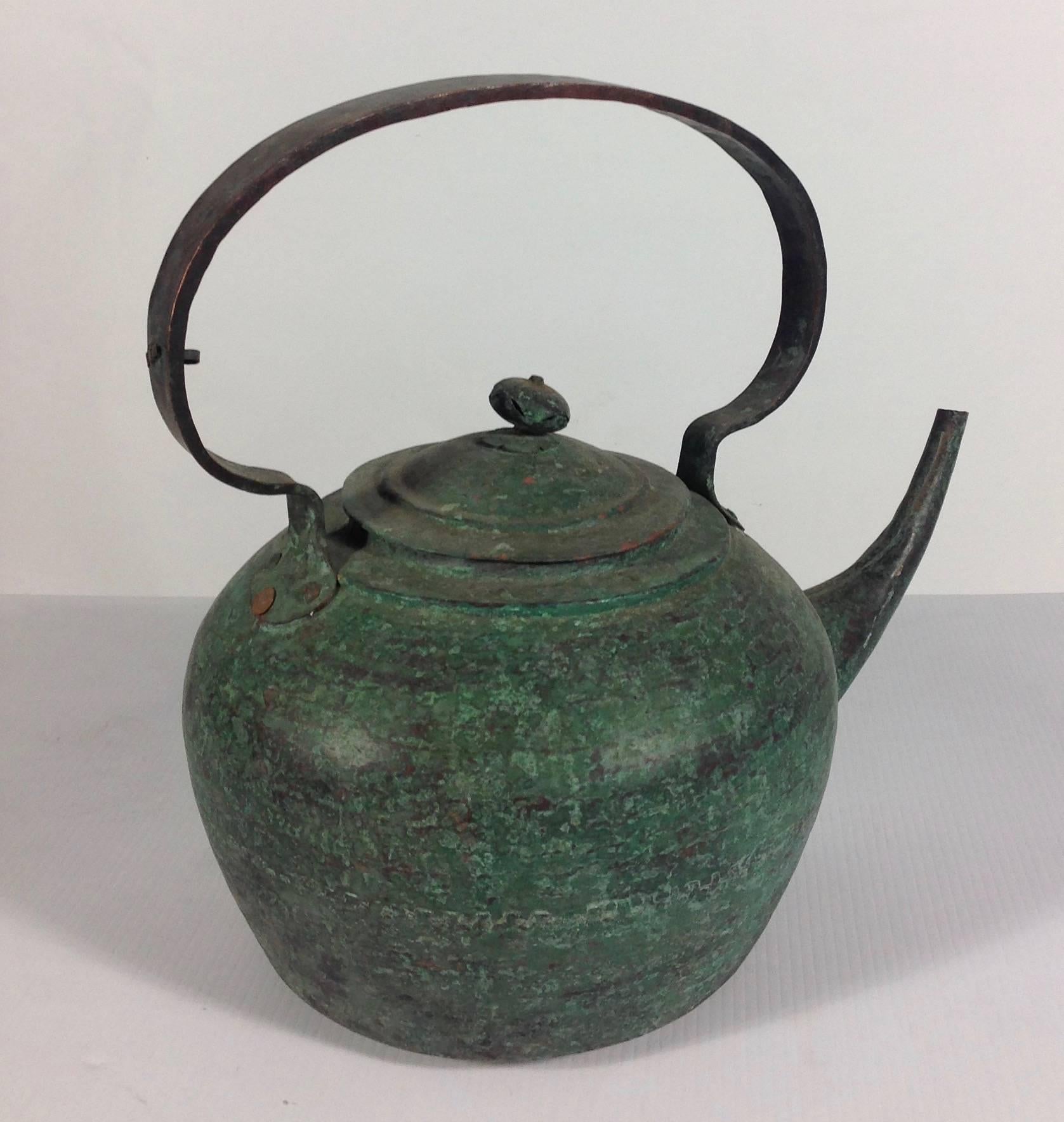 Gorgeous and lyrical Javanese copper kettle from the early 20th century.