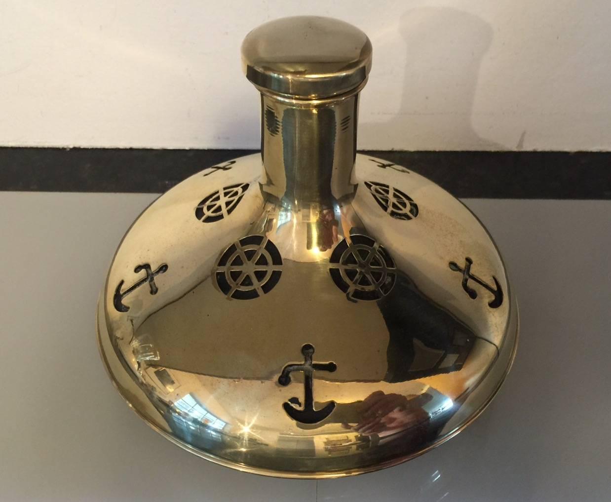 Swedish brass decanter with nautical themed decoration.
Has sign 