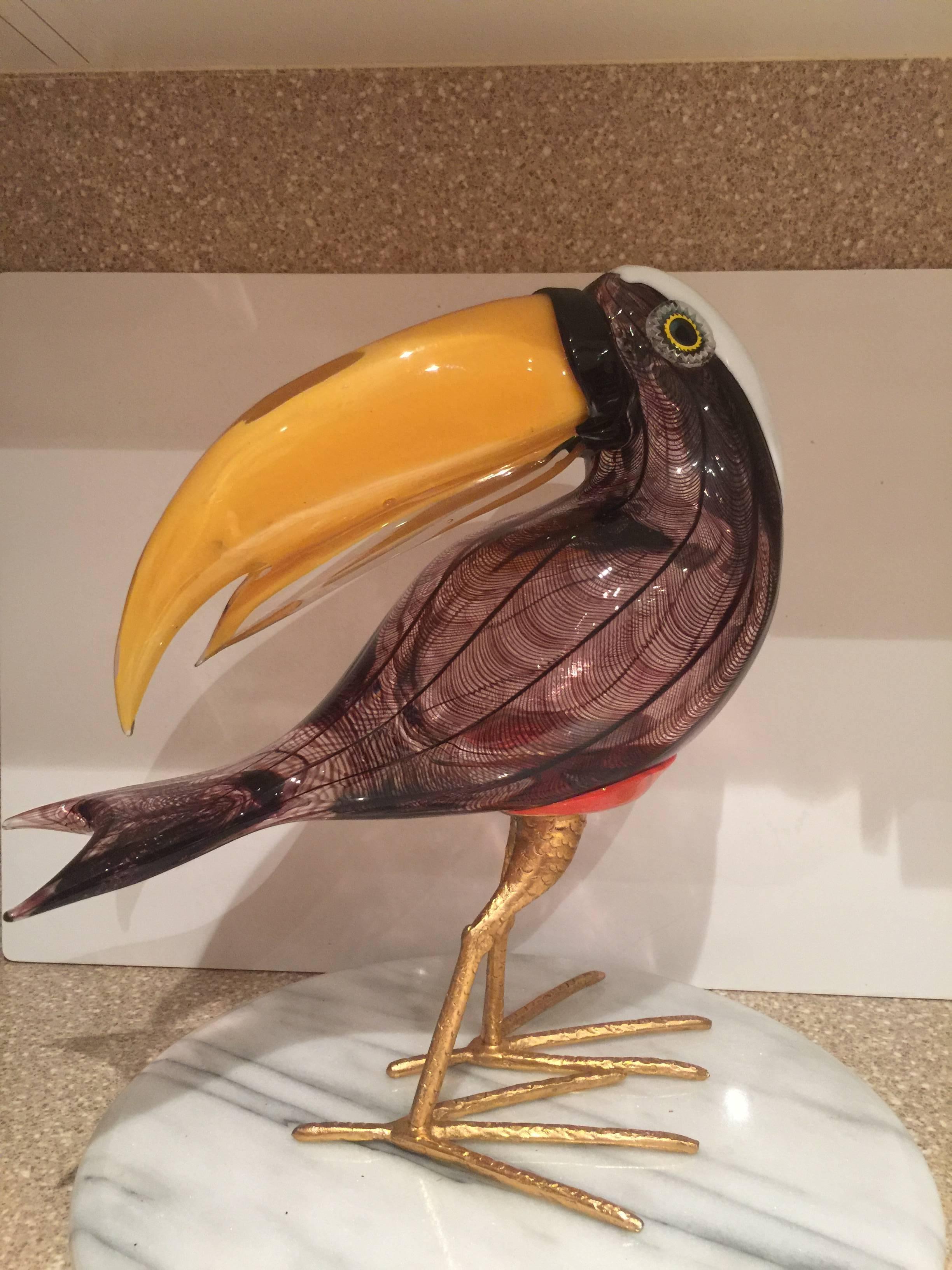 A magnificent handblown Murano glass toucan signed Zanetti L.
The body of the bird is beautifully mounted on gilt metal feet adding to the elegance and beauty of this piece.
Zanetti is from one of the most distinguished glass families.
Working