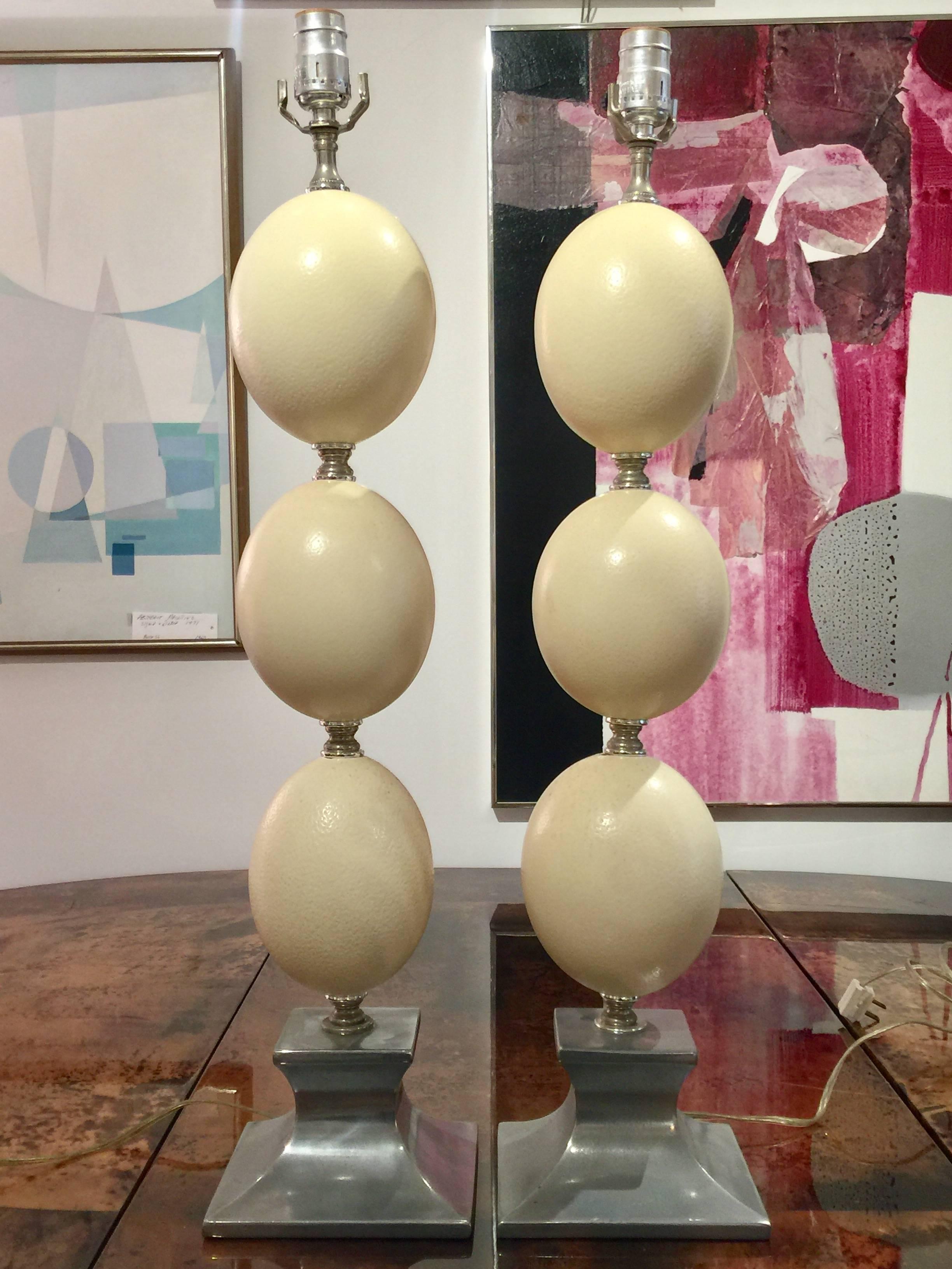 A pair of ostrich egg and silverate lamps attributed to Anthony Redmile.
The lamps have an elegant simple design.
Great combination of materials and scaled beautifully.
Unsigned but the quality, materials use and design of these lamps certainly