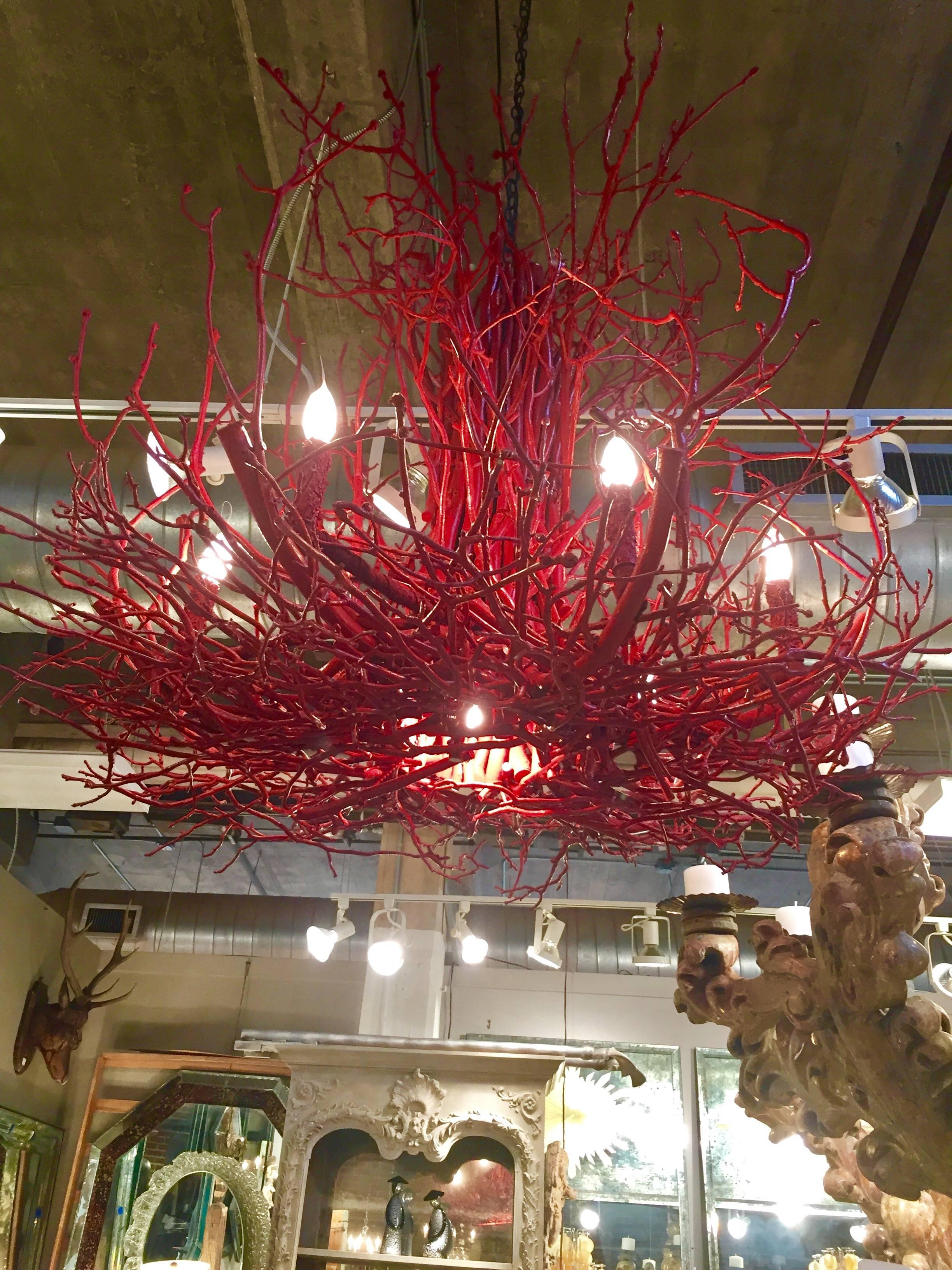 A custom chandelier of twigs painted and formed to look like coral.
Great scale and shape.