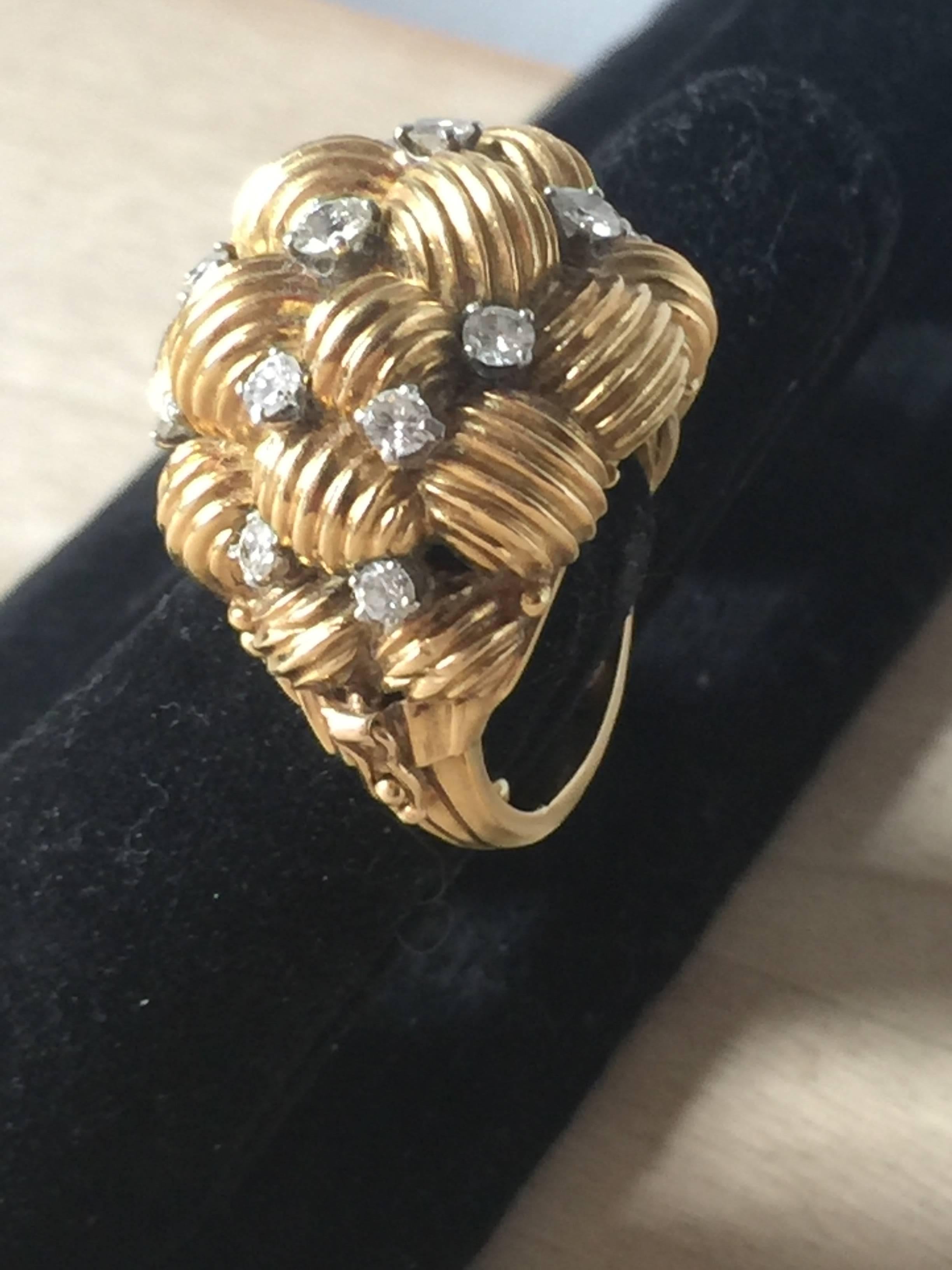 A fantastic Midcentury gold and diamond cocktail ring.
Fabulous knotted design which is highlighted with diamonds across the dome. 
This piece has been styled in classic Hollywood glamour.
Quality and styling of this ring in the style of the