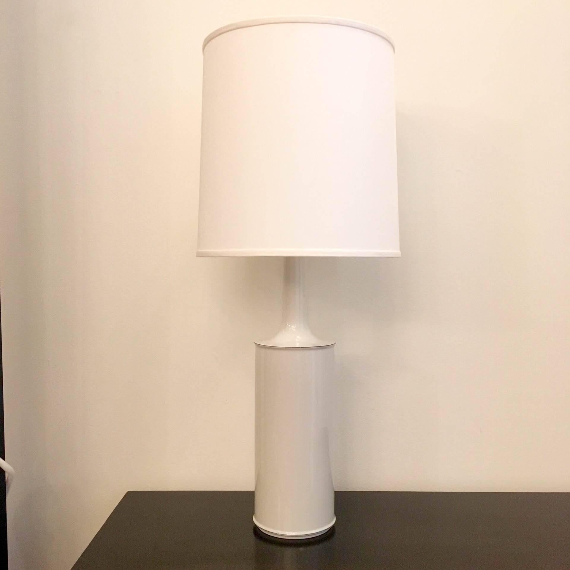 A great simple modern pair of 1960s white with a silver border porcelain table lamps by the Danish firm, Royal Copenhagen. Signed. Newly rewired.