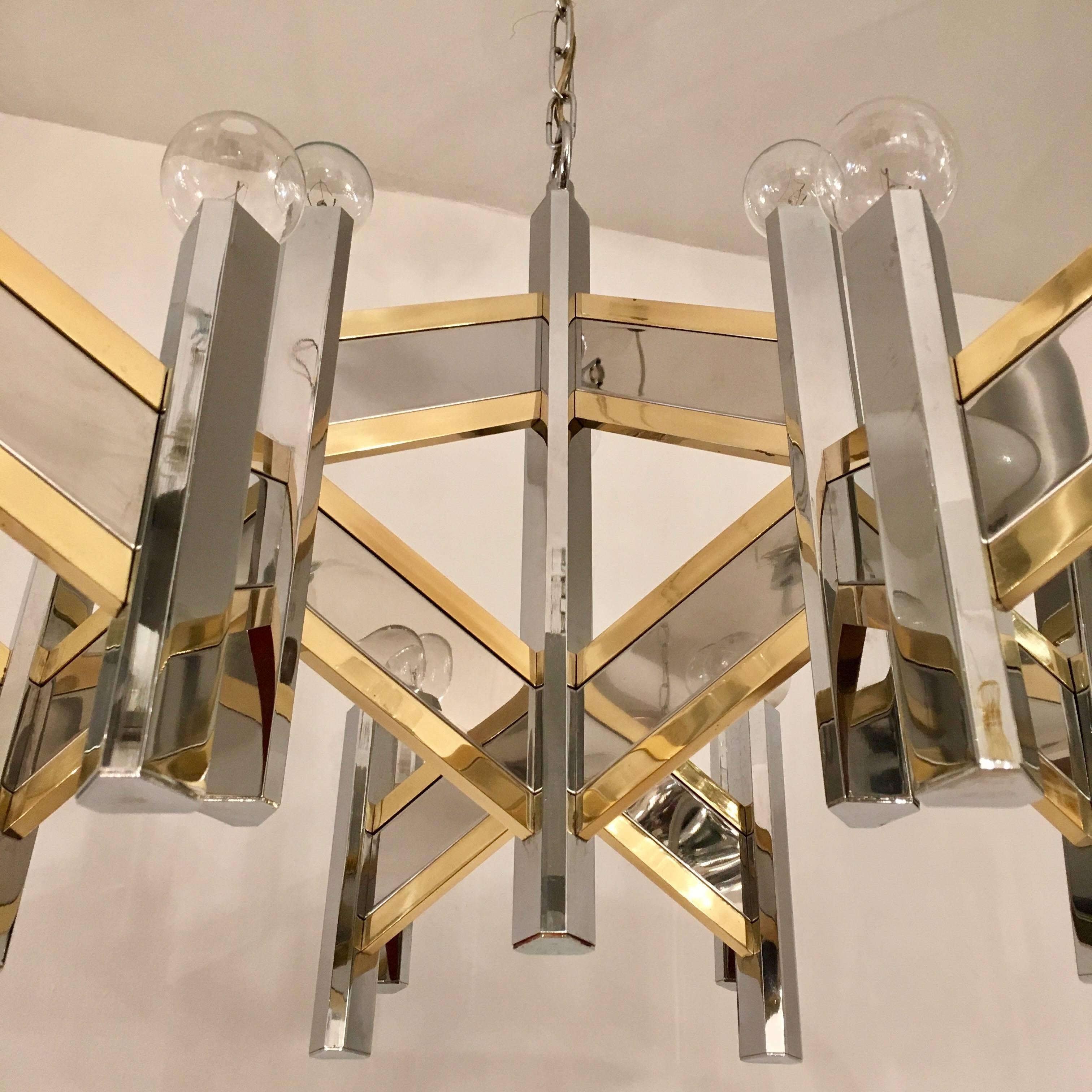 A great large 1960s polished brass and chrome fourteen-light chandelier by the famed Italian lighting company, Sciolari. Newly rewired.
