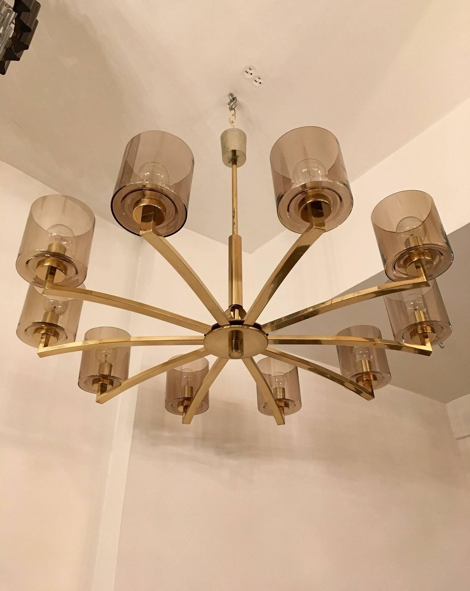 A large ten-light Swedish golden brass chandelier with light smoked glass shades. Newly Rewired.