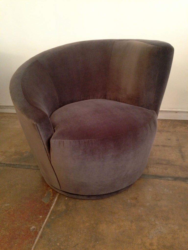 A classic pair of V. Kagan for Directional furniture swivel dove grey club chairs.