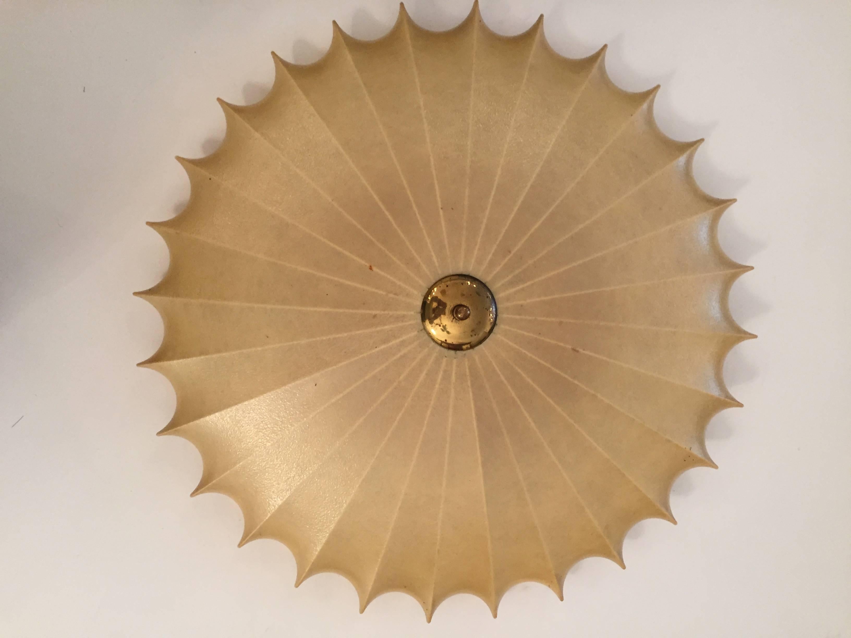 An original 1960s spun resign sculptural flush ceiling light with an aged brass fitting. Rewired.