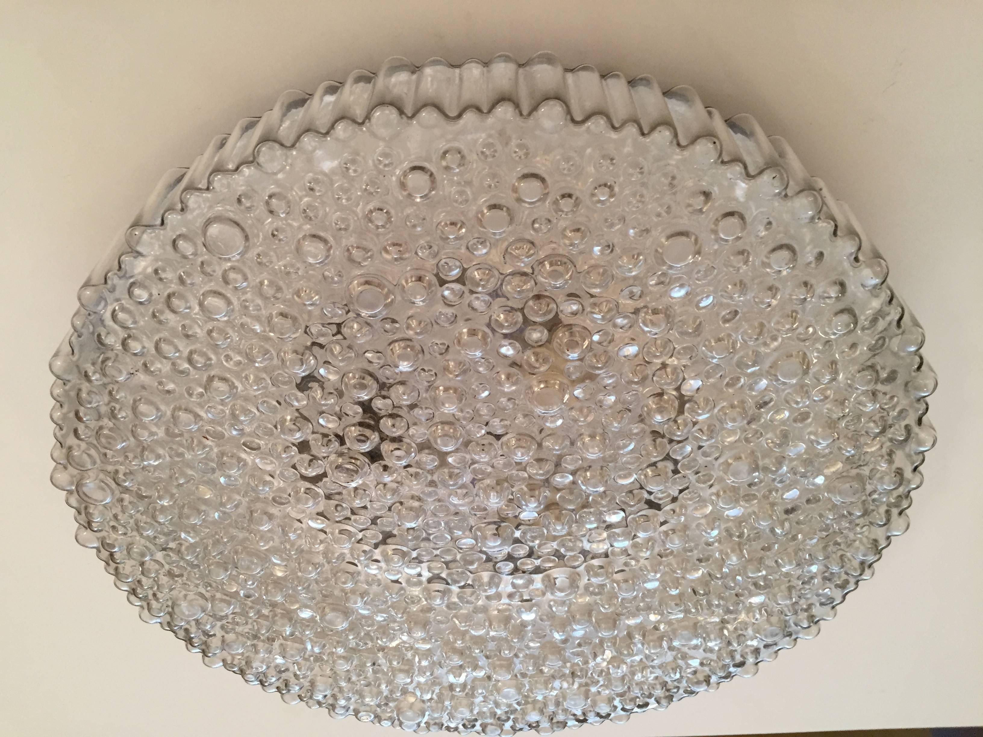 A wonderful Austrian  large, sparkly, bubbled glass flush light by Limburg. Three-light sources. Newly rewired.
