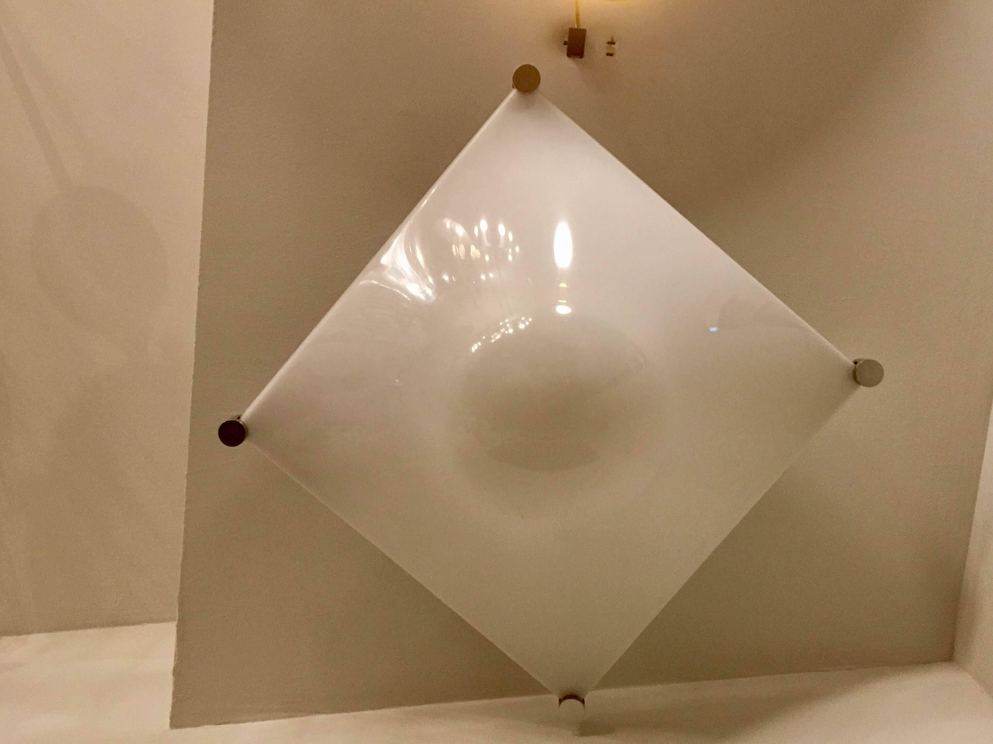An original 1960s Italian Space Age sculptural flush ceiling or wall light by Elio Martinelli. Newly rewired.