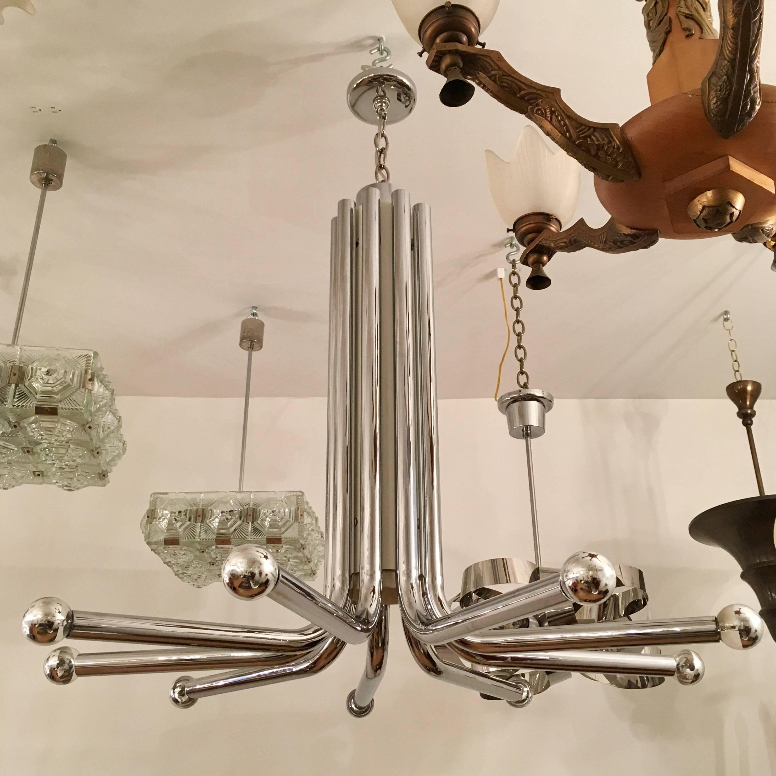 A highly sought 1970s polished chrome sculptural chandelier by the famed Italian lighting company, Esperia, Newly rewired.