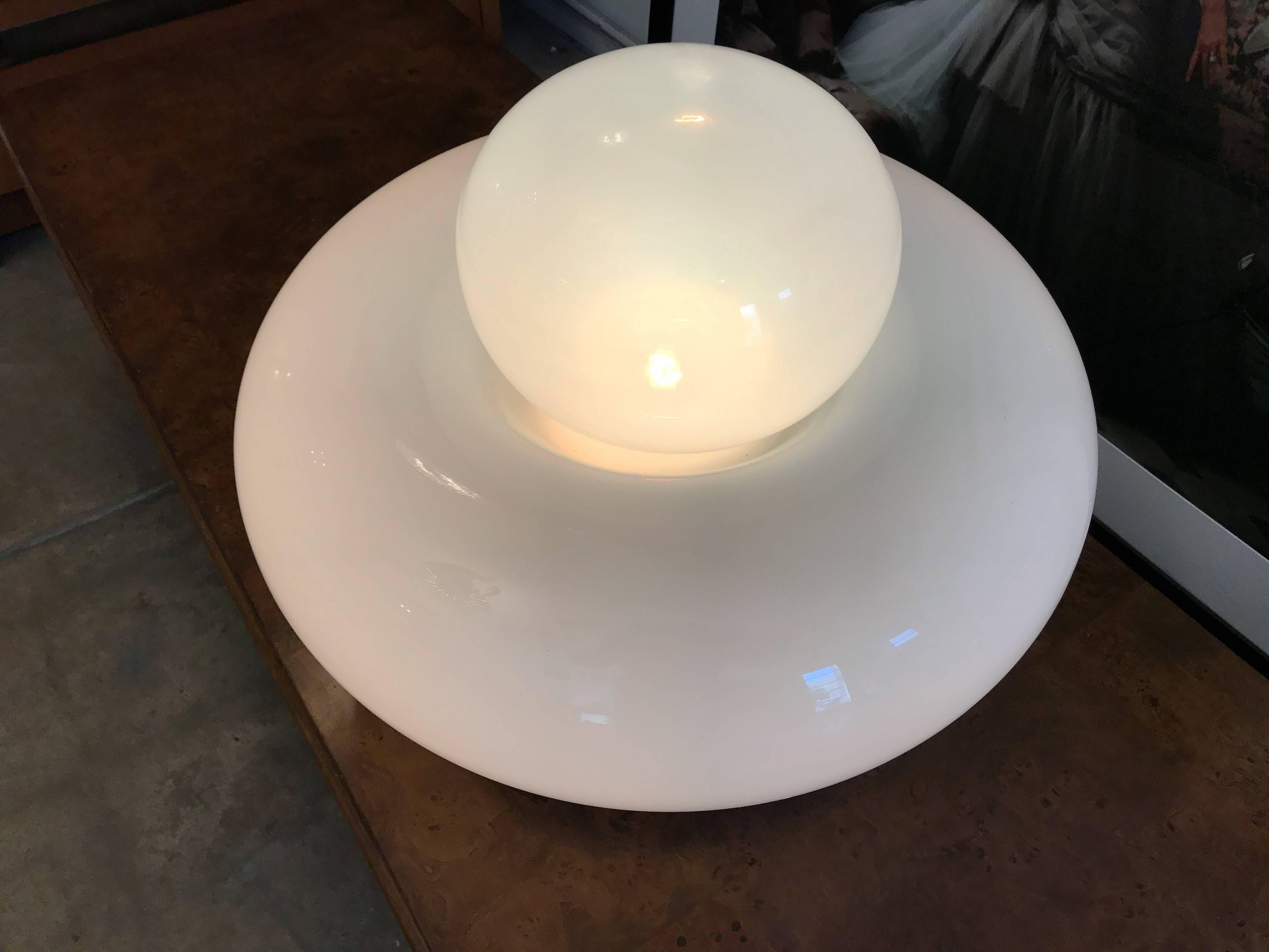 An original 1960s white milky two-piece glass light sculpture designed by Giuliana Gramigna for Artemide. Newly rewired. Possible second available.
