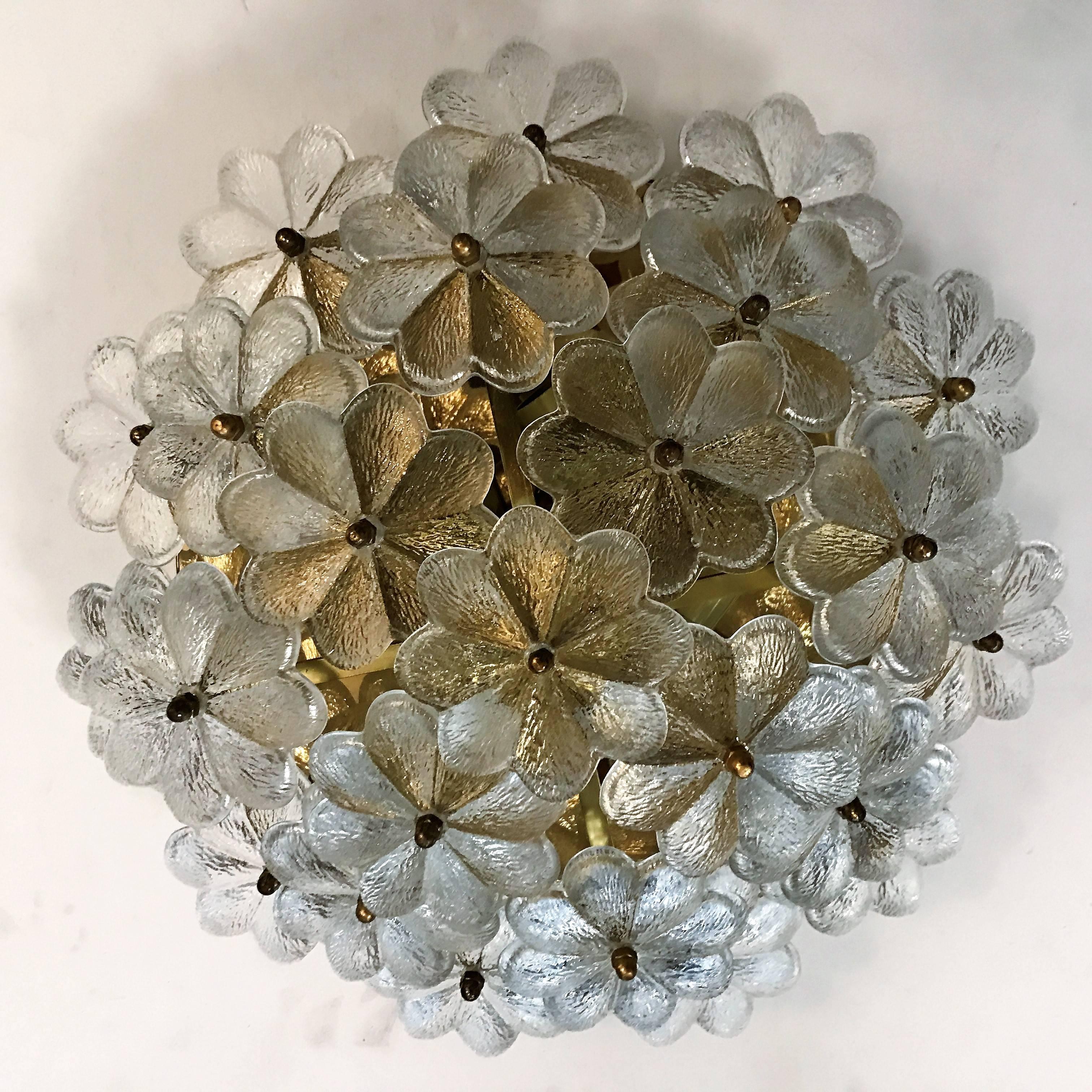 A beautiful 1960s Austrian glass floral and golden brass light fixture which can be used as a ceiling or wall light. Newly rewired. Four-light sources. Two other sizes available.