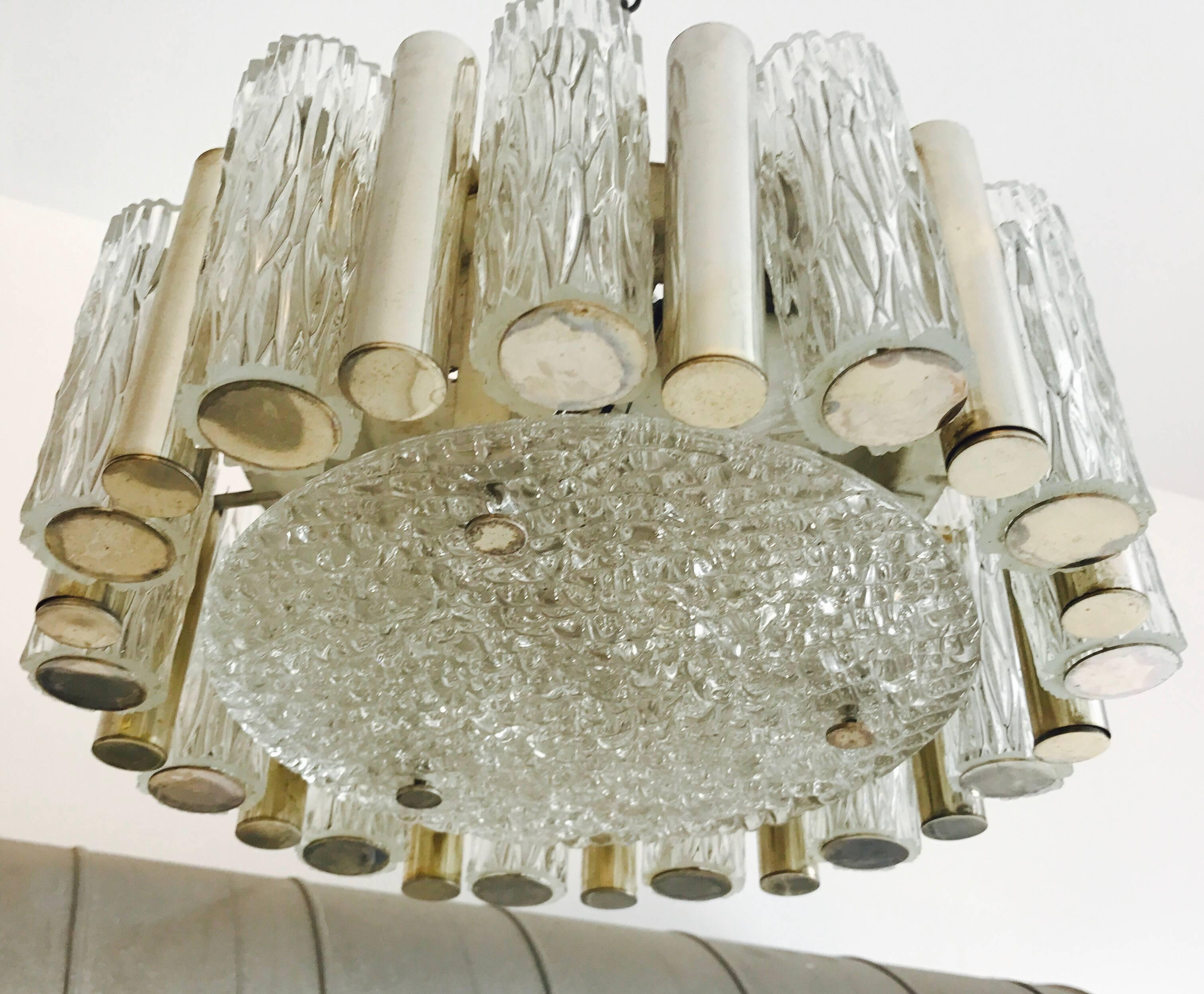 A wonderful 1960s textured glass and aged polished brass flush ceiling or hanging pendant by Kaiser. Newly rewired.