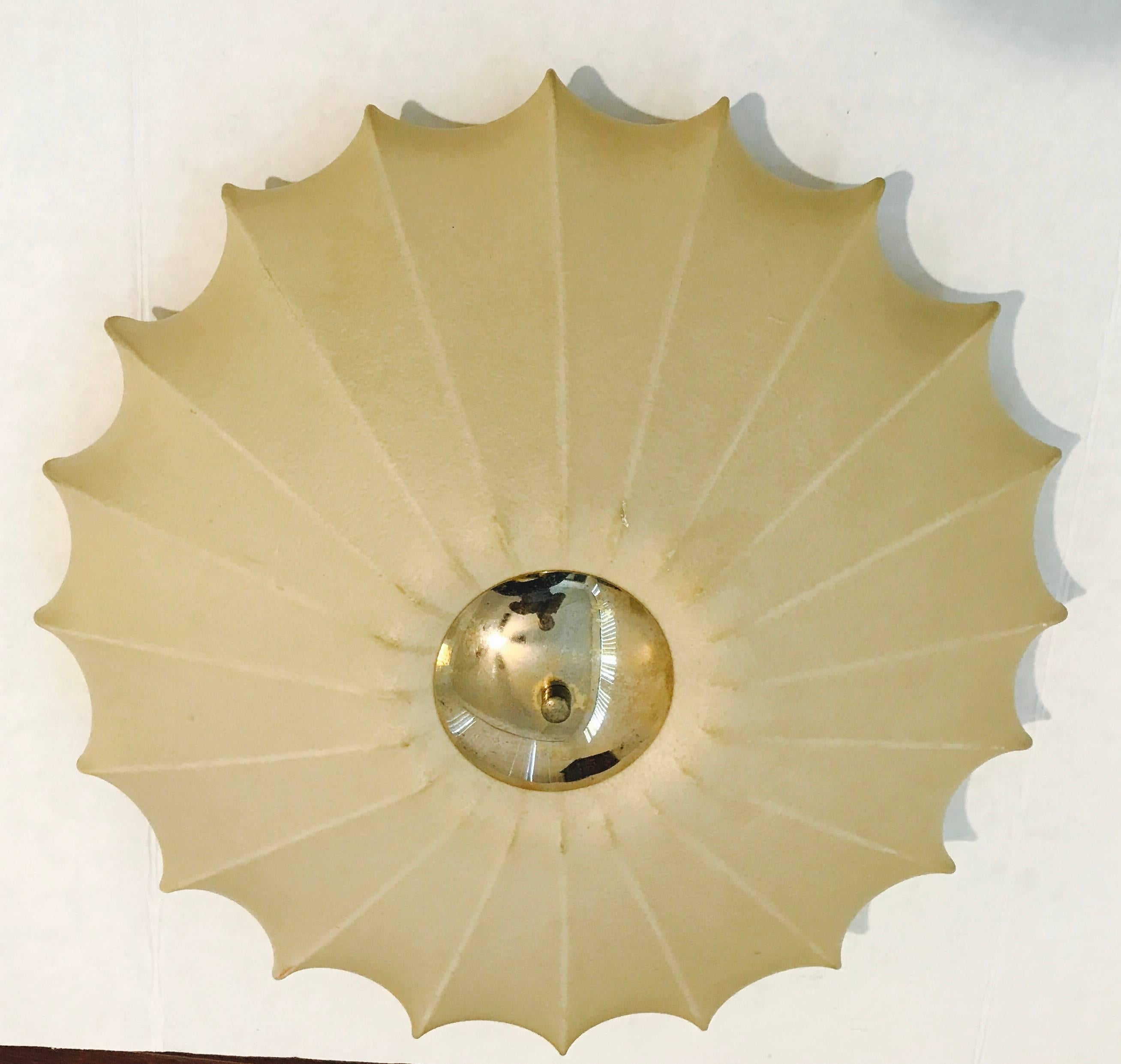 An original 1960s spun resin sculptural Italian ceiling or wall light with an aged brass fitting designed by Achille Castiglioni for Flos. Newly Rewired . Two Standard sockets.