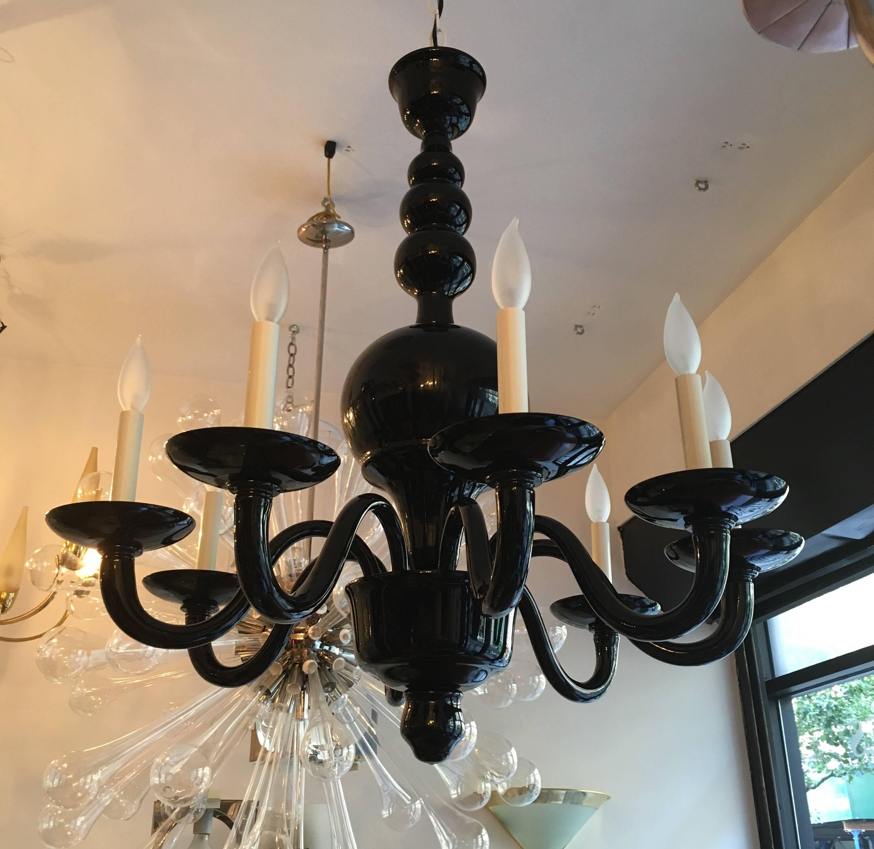 A rare and beautiful 1970s thick dark glass blown Murano six-arm chandelier. Newly rewired.