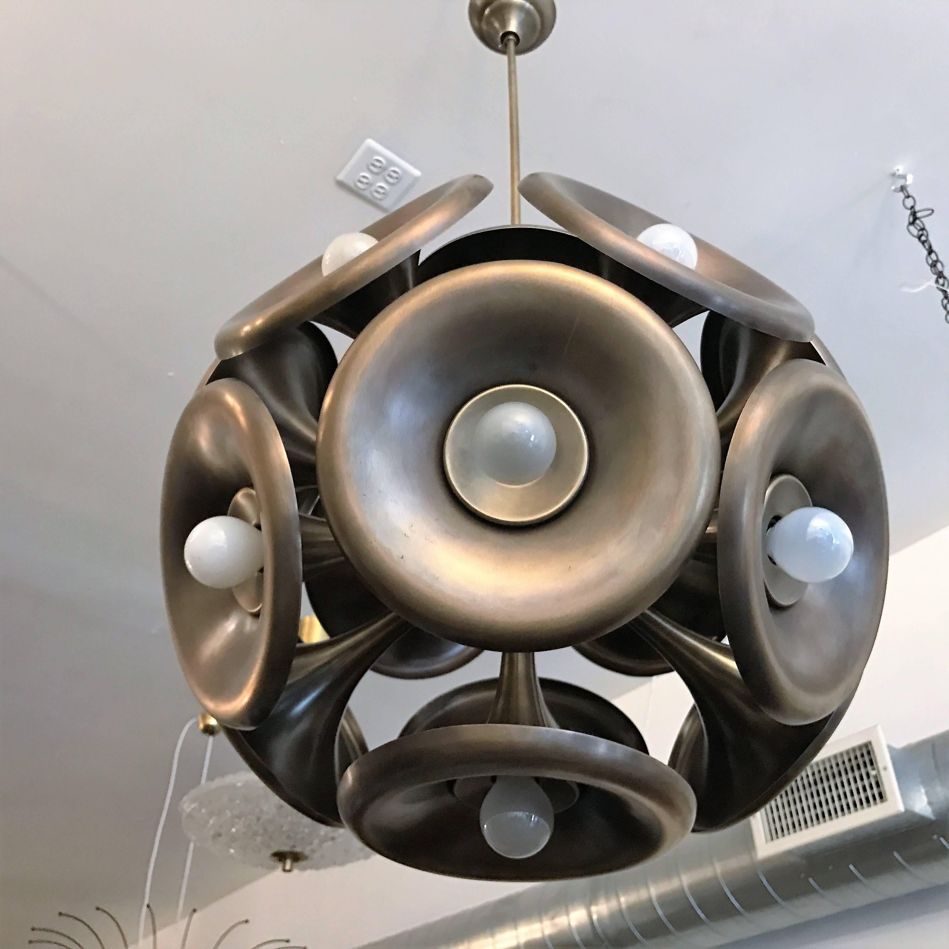 A great, rare 1960s Space Age pendant in a wonderful uniform dark aged brass made by the Italian lighting company, Esperia. Newly rewired. 

Biography:
Esperia SRL was founded in 1952. Exclusive and original collections were created by noted