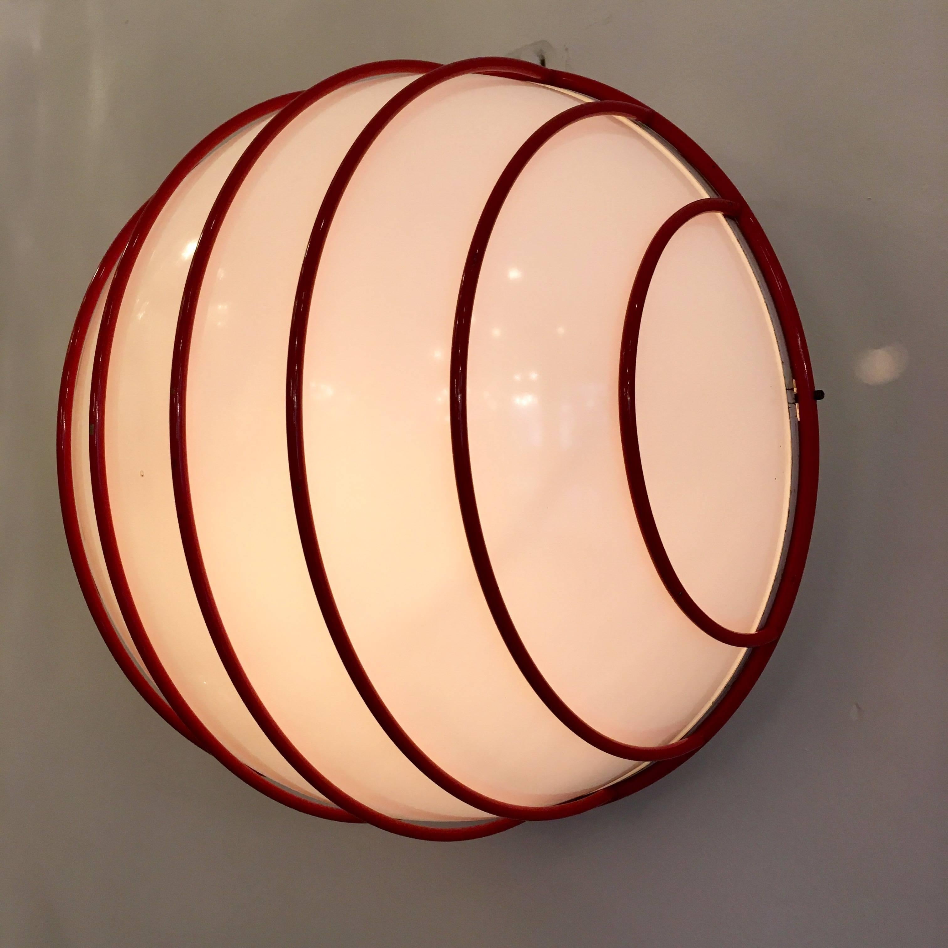 A colorful 1980s sculptural ceiling or wall light composed of a bright red cage and PVC shade made by the famed Italian lighting company, Esperia. Newly rewired.
