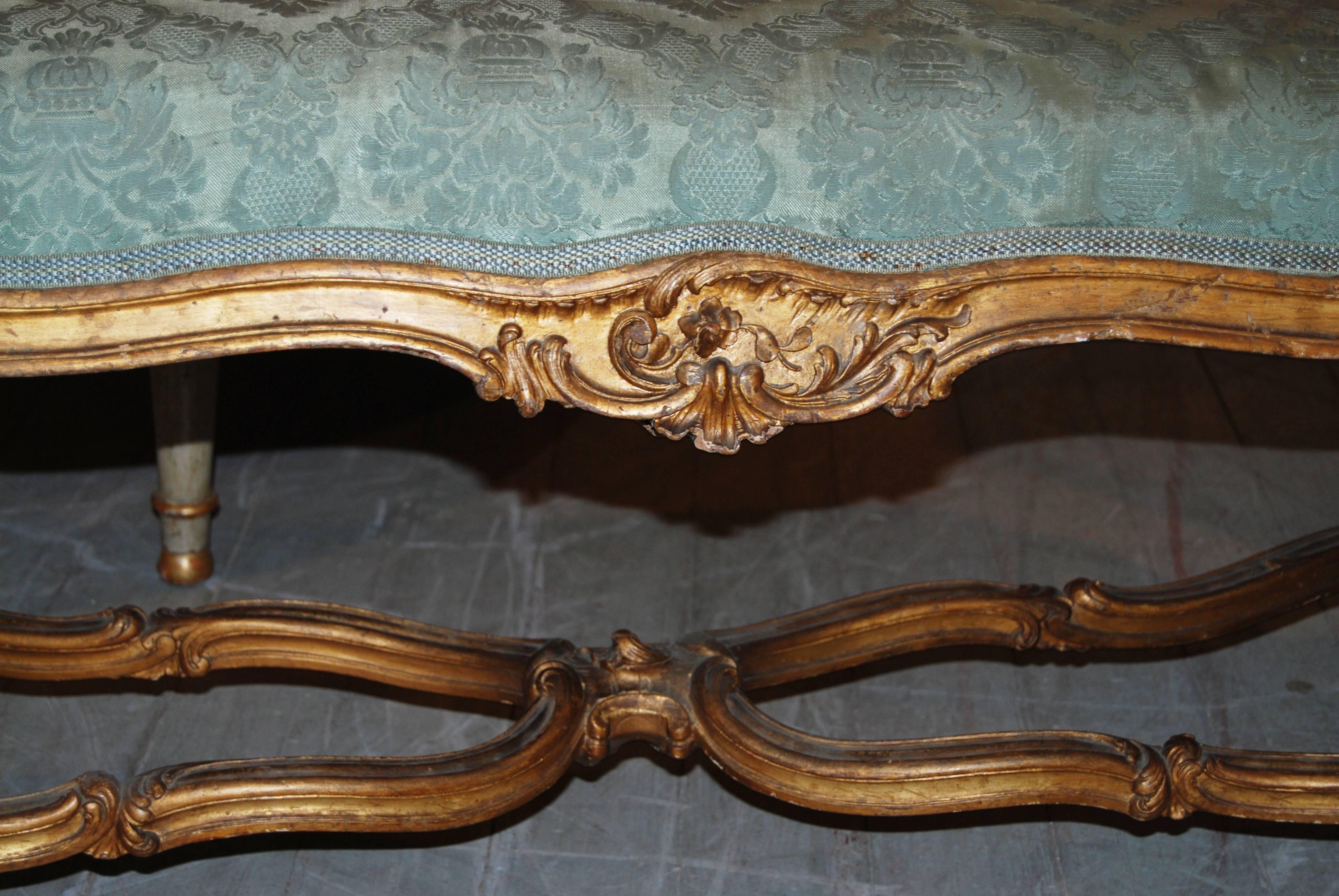 19th century carved and gilded bench.