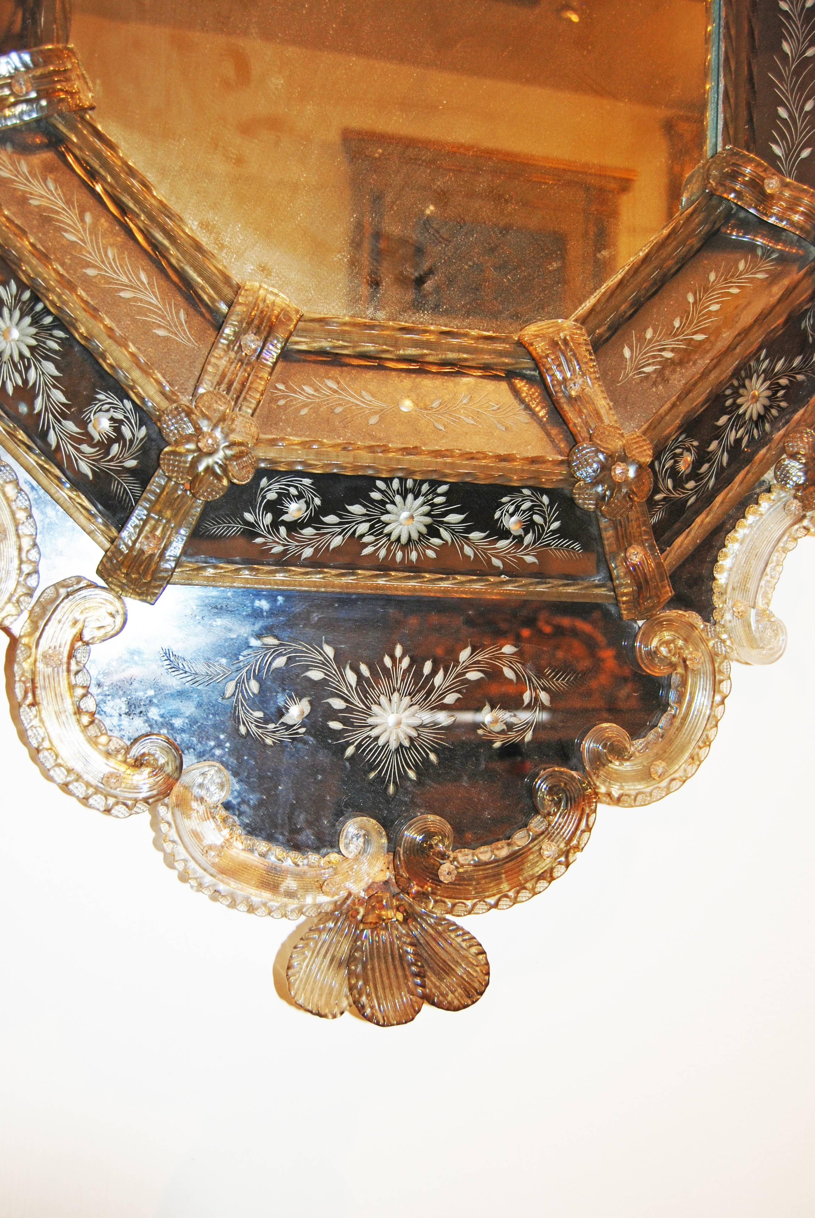 19th century Venetian mirror with Murano glass accents.
