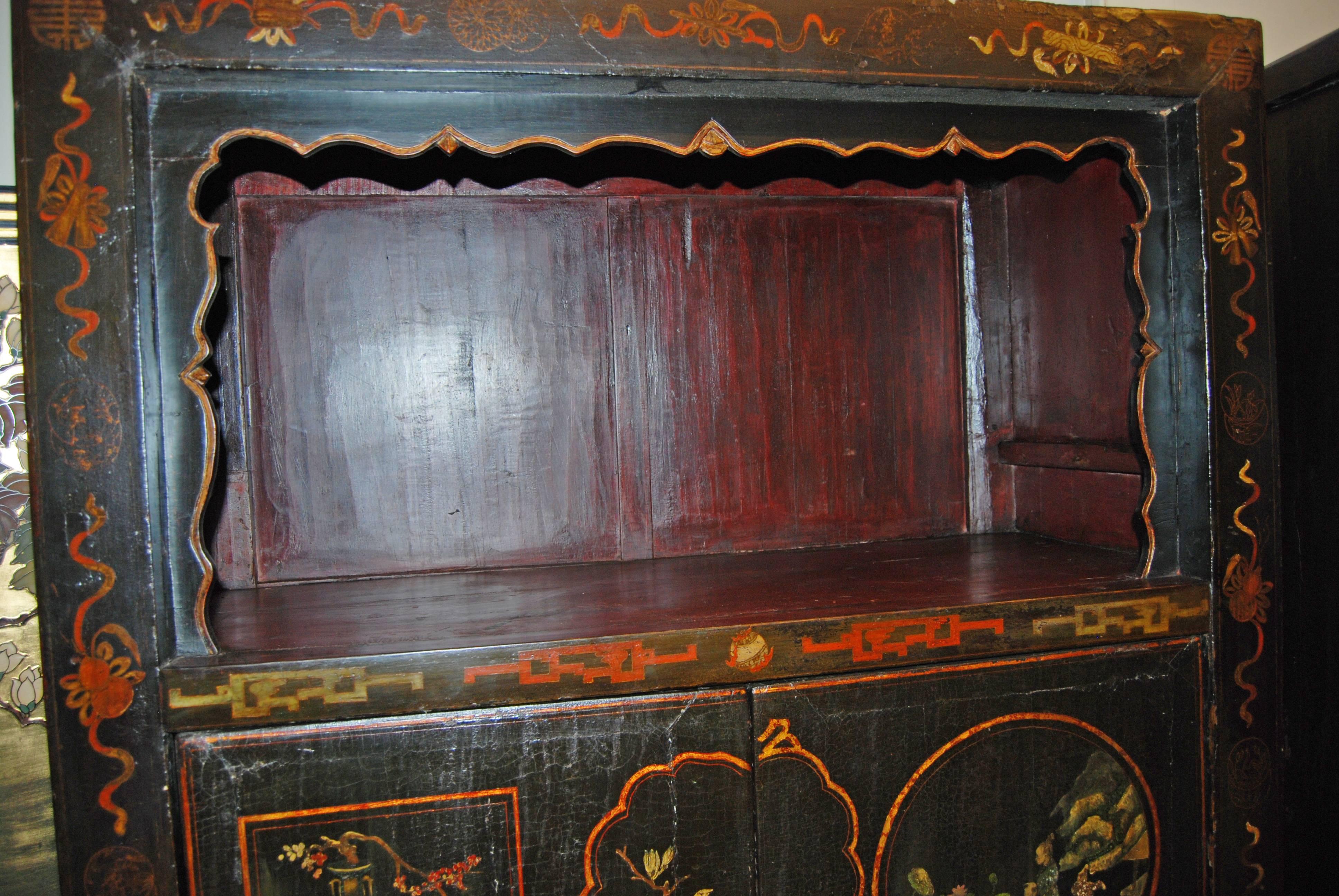 Pair of lacquered and decorated Chinese cabinets.