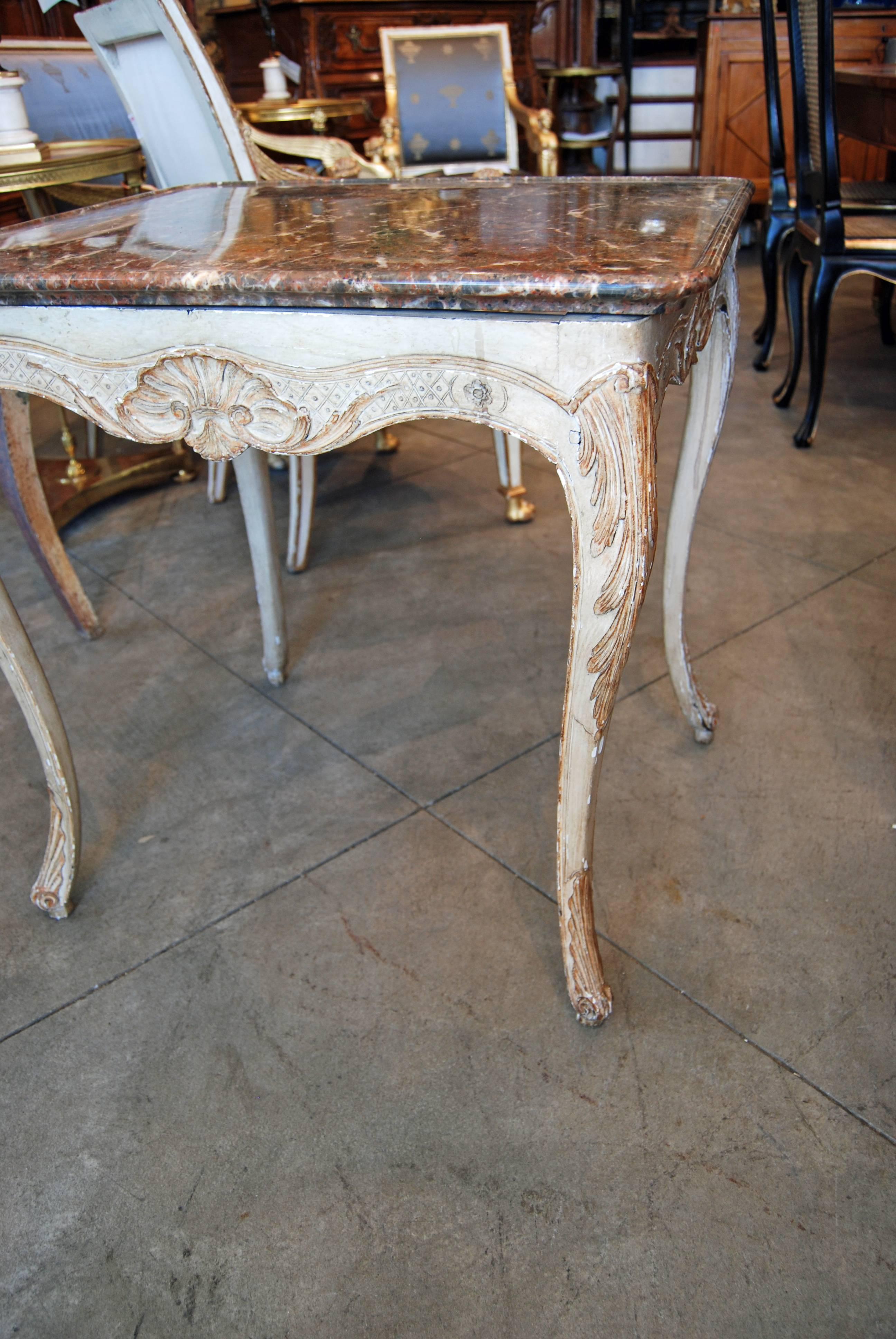 19th century carved and painted side table with original marble.