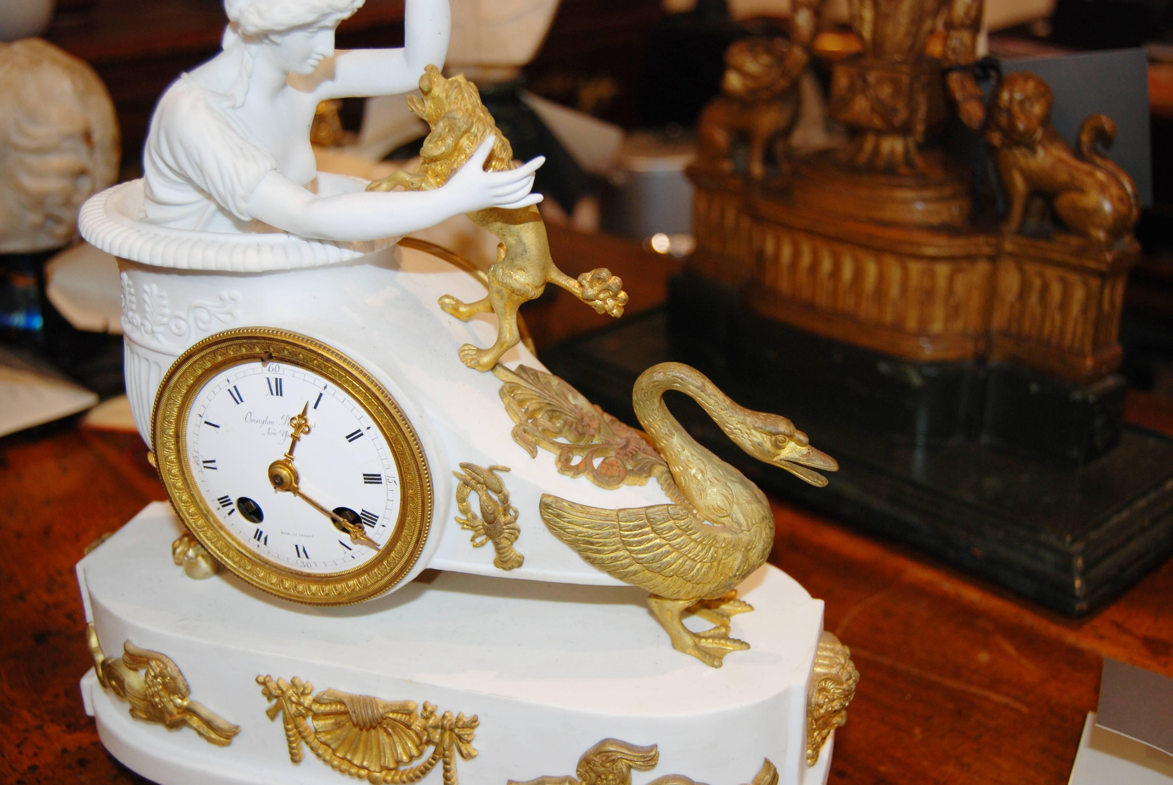 Empire bisque and bronze doré' mantel clock.

 