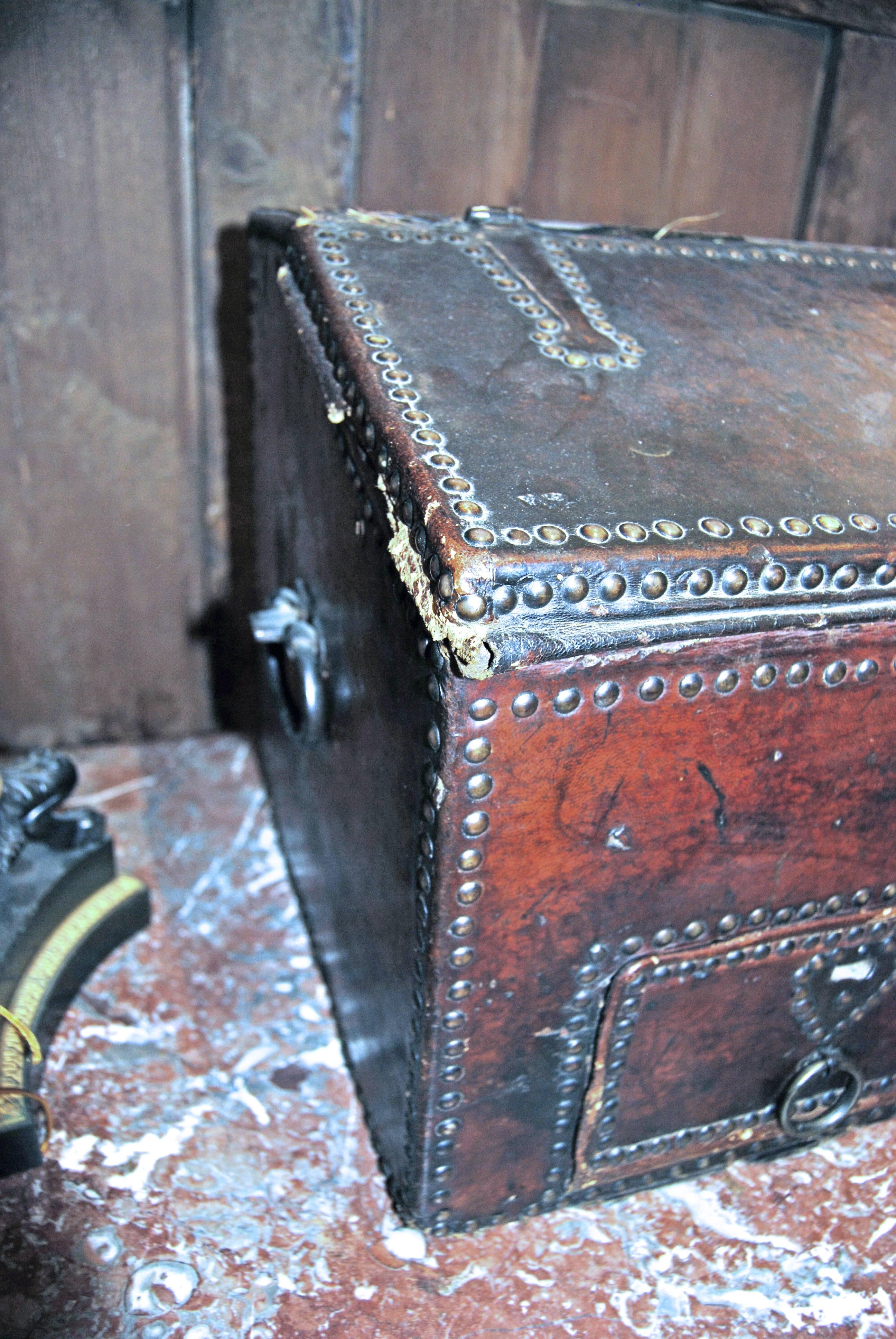 Leather and grommet letter box with secret drawers and containers. Also, fully portable and beautifully appointed.
